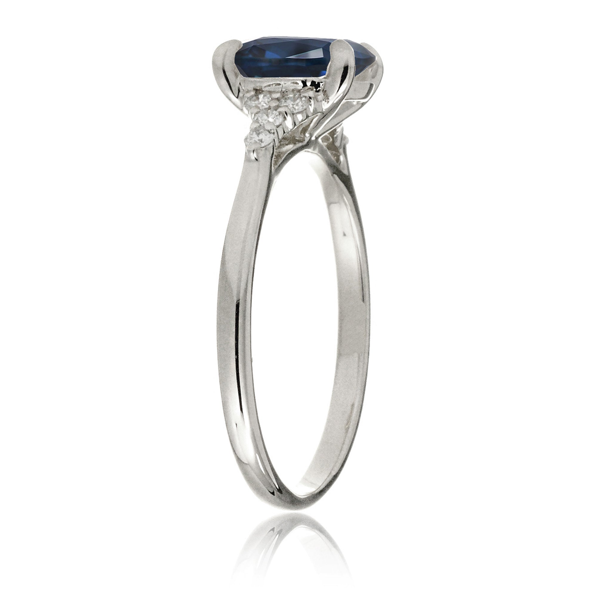 Cushion cut diamond three stone ring white gold