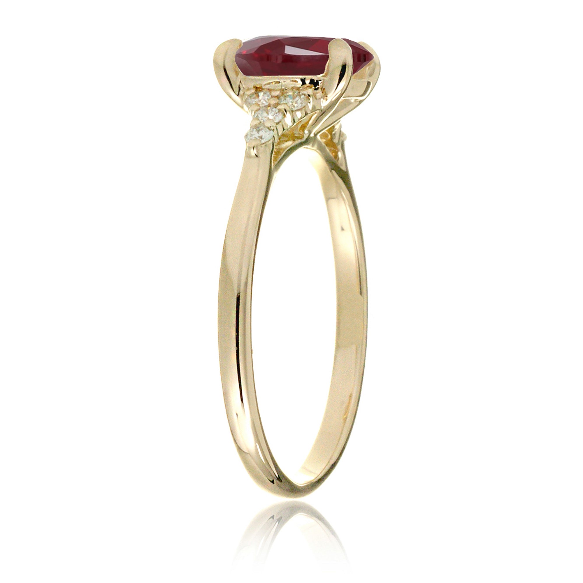 Cushion cut lab-grown ruby and diamond ring yellow gold