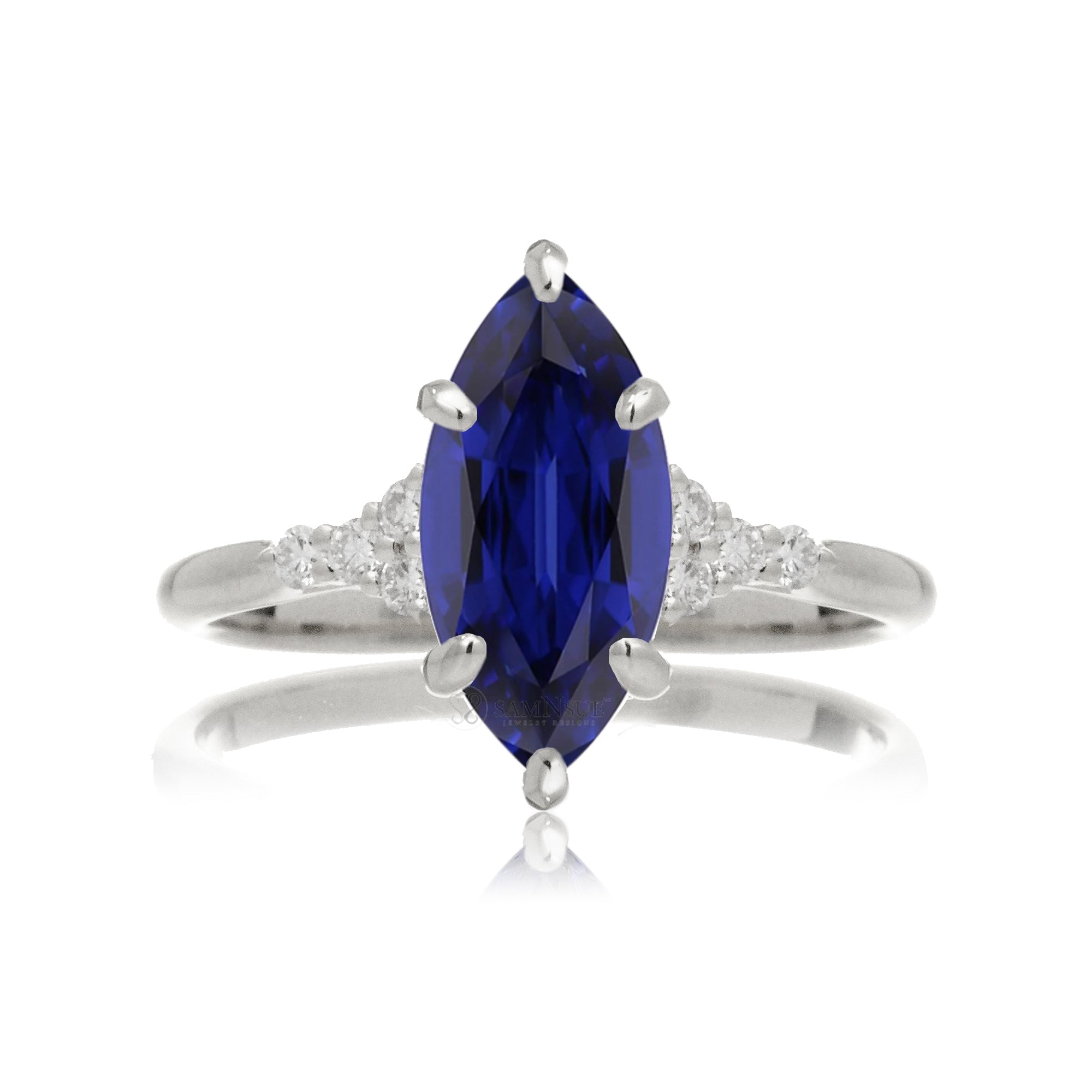 Marquise sapphire diamond three stone engagement ring in white gold