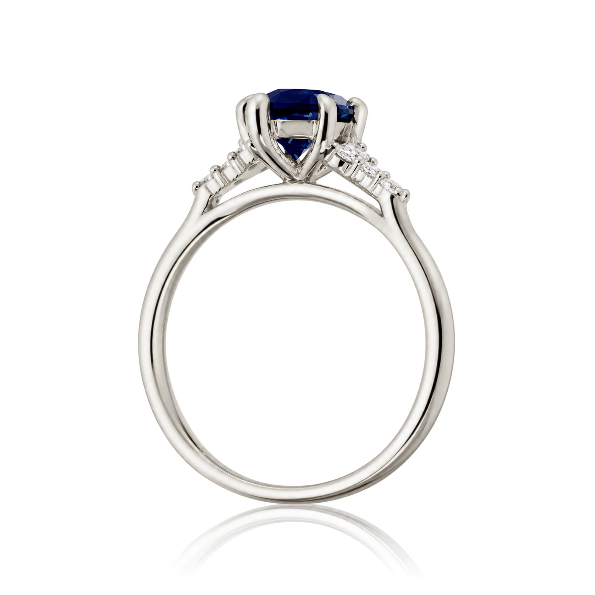 Marquise sapphire diamond three stone engagement ring in white gold