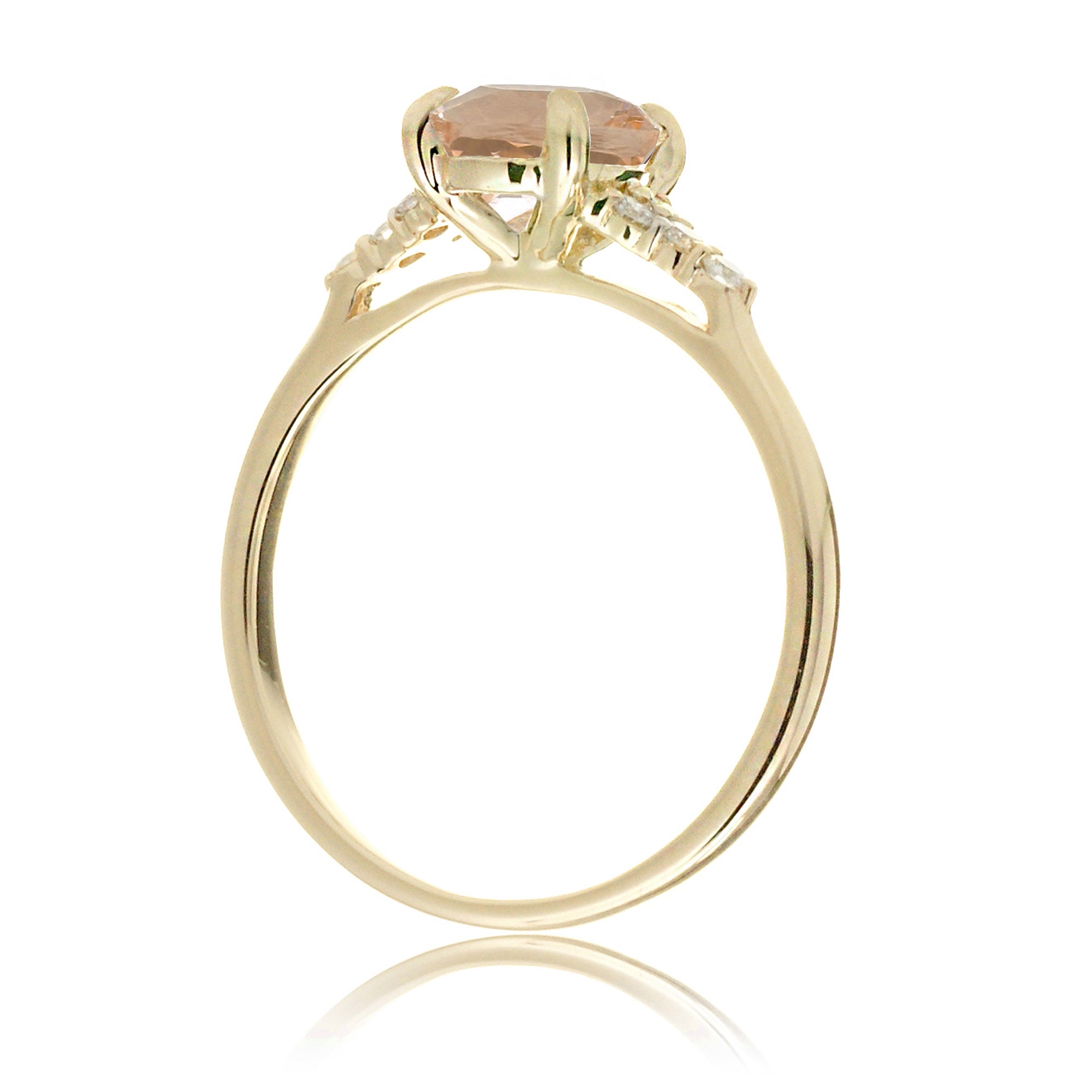 Cushion morganite ring with solid band and diamond accent in yellow gold