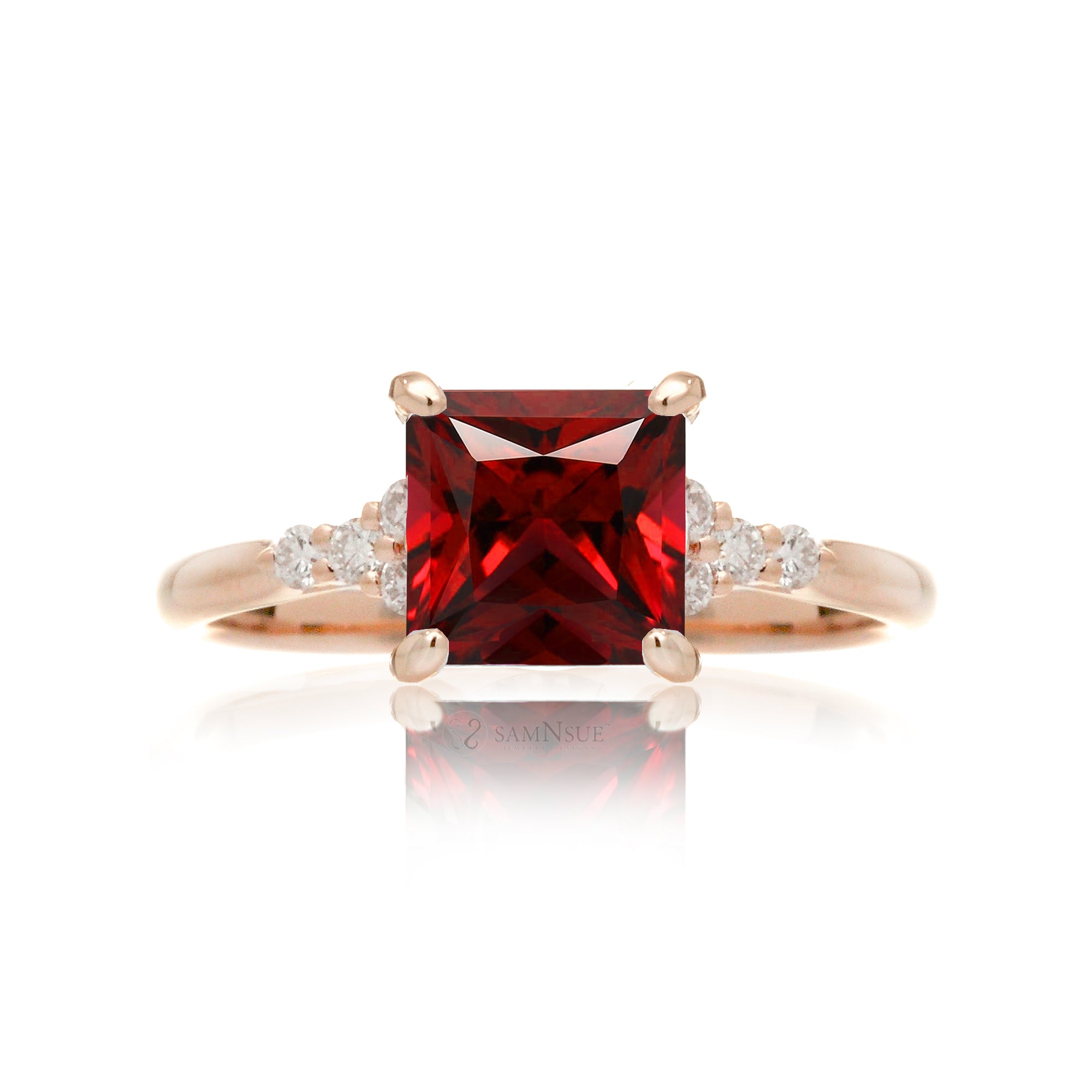 Ruby ring with princess cut and diamond accent in rose gold