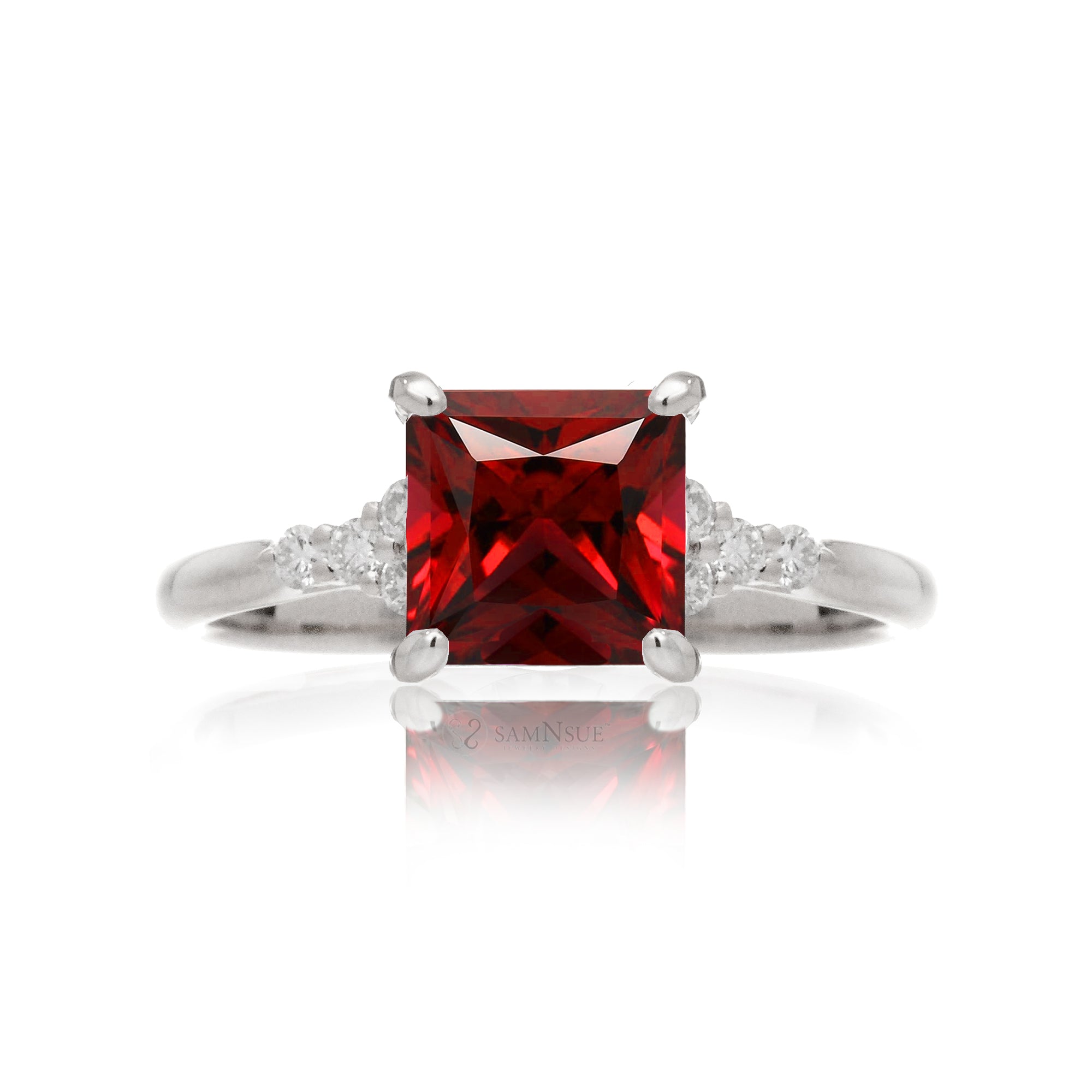 Ruby ring with princess cut and diamond accent in white gold