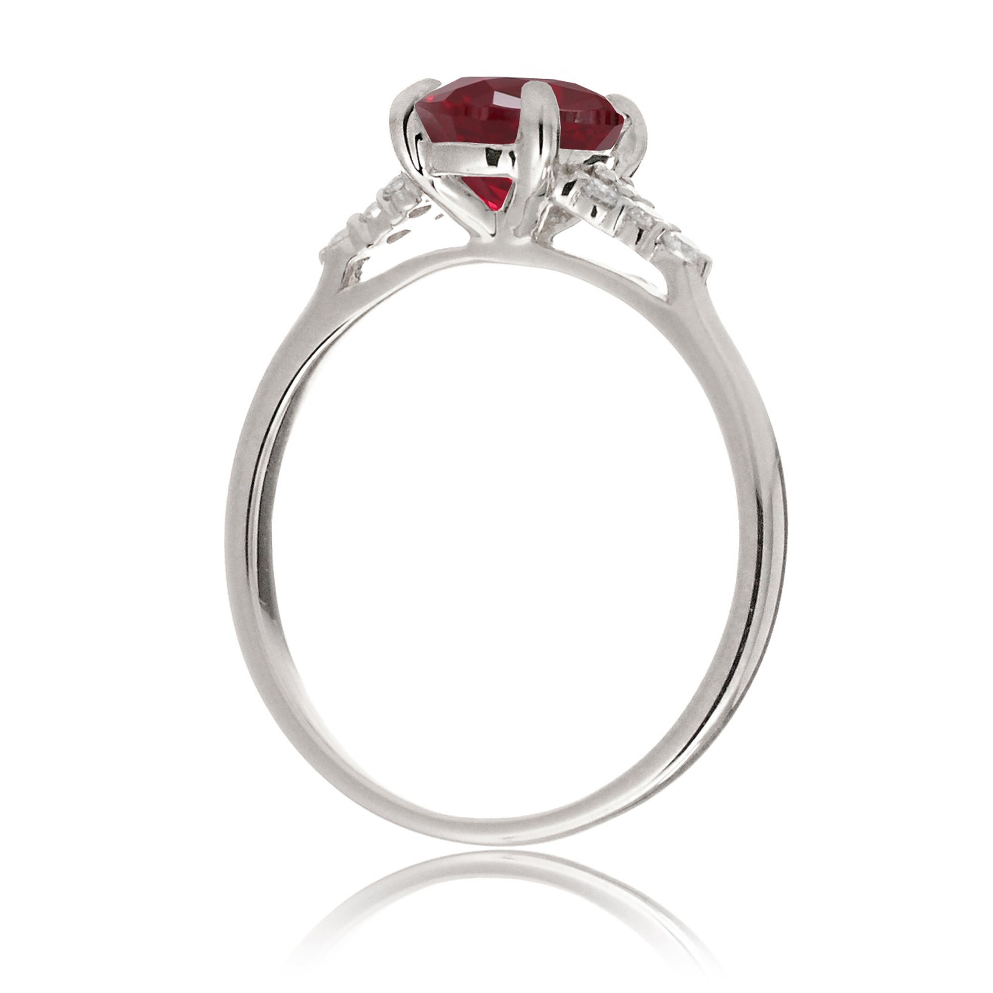 Ruby ring with princess cut and diamond accent in white gold