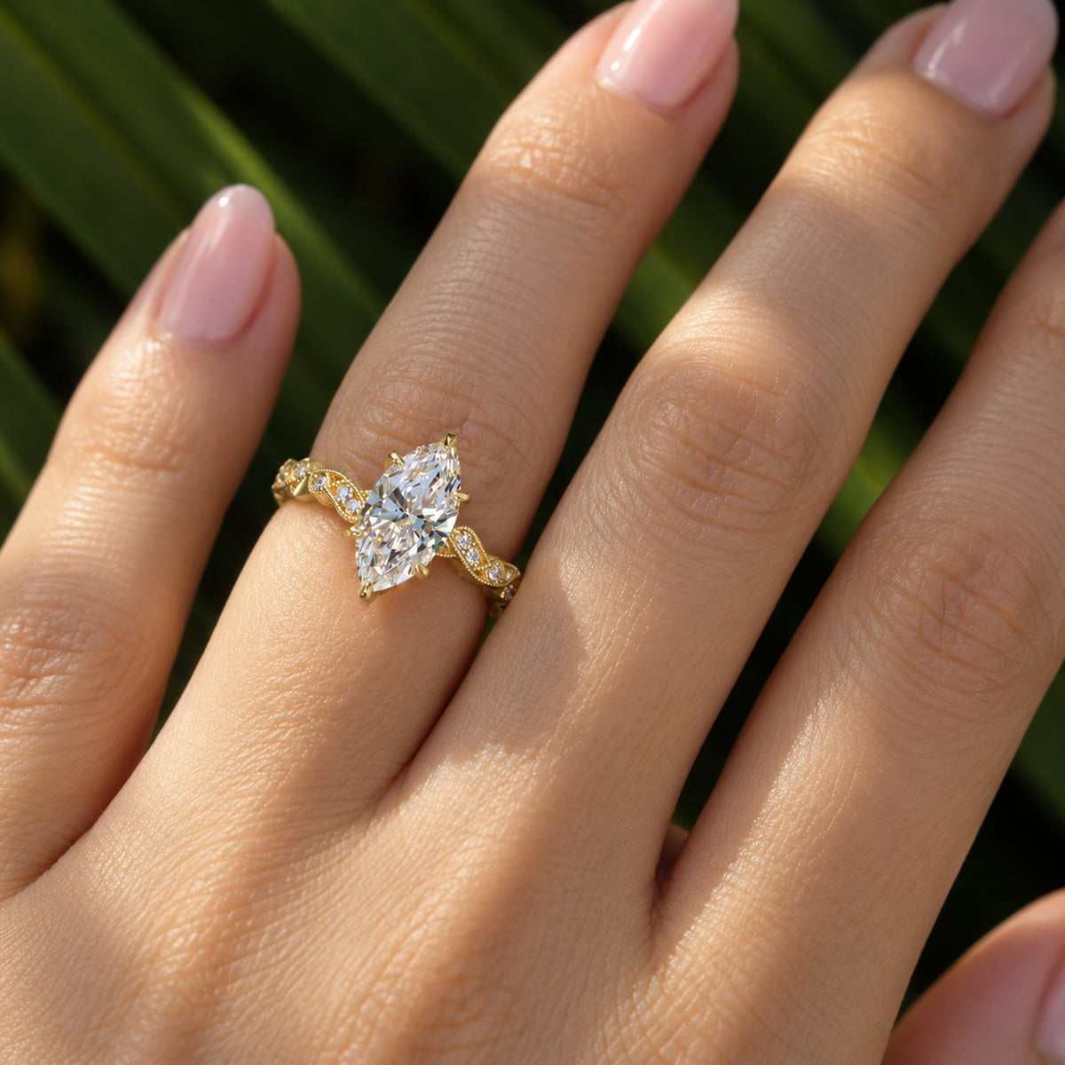Marquise diamond ring 1.50ct flower prongs and filigree ornate diamond band in yellow gold in stock on a hand