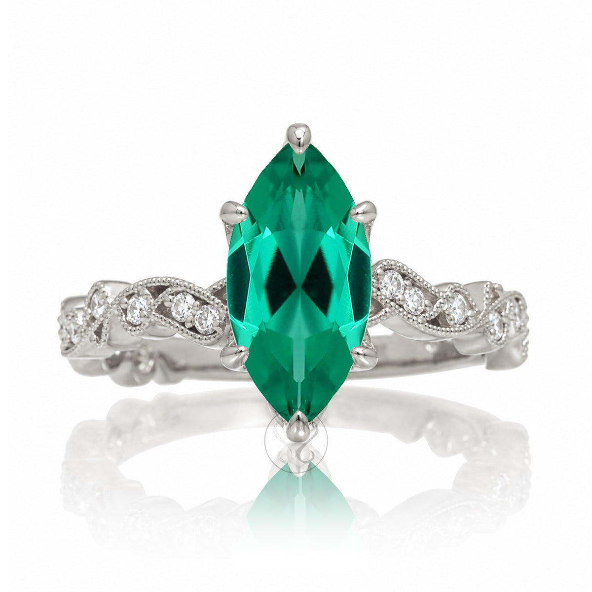 The Elara Marquise Emerald Ring