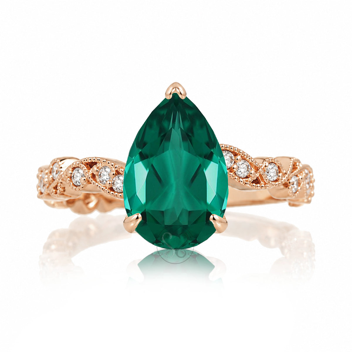 The Elara Pear Emerald Ring