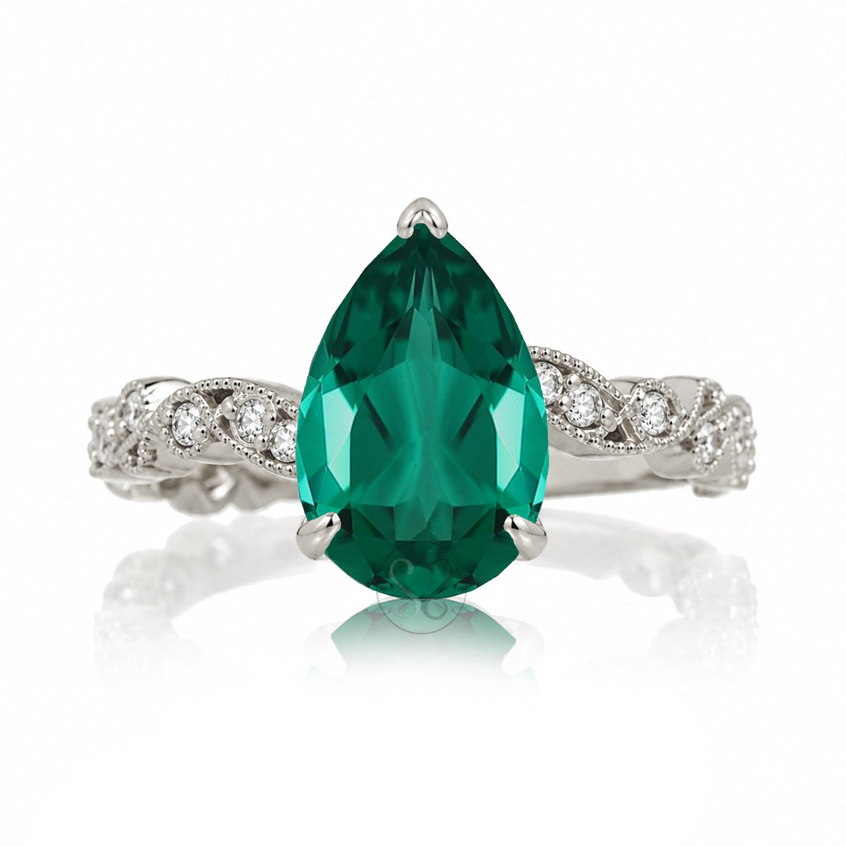 The Elara Pear Emerald Ring
