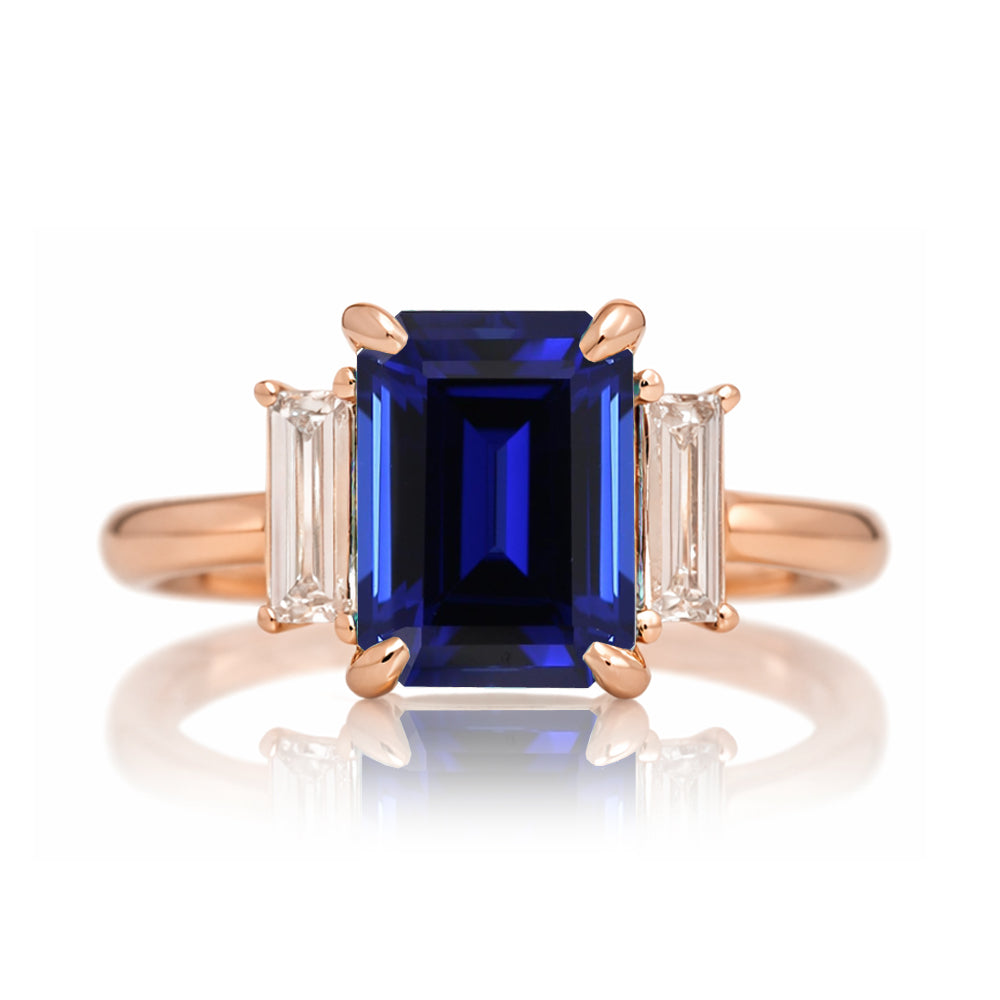 Emerald cut blue sapphire ring with long baguette three stone solid comfort fit rounded band rose gold