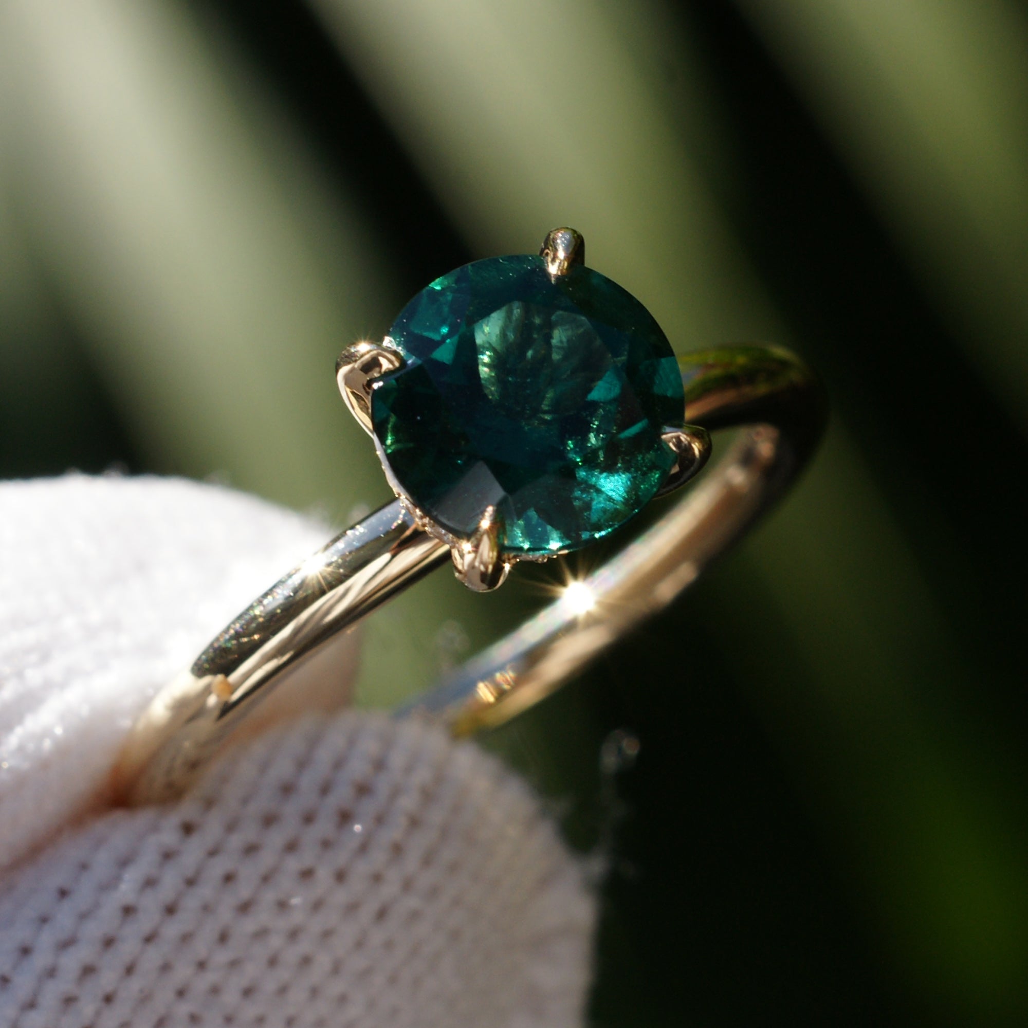 Round cut emerald hidden halo solitaire engagement ring yellow gold the Lucy