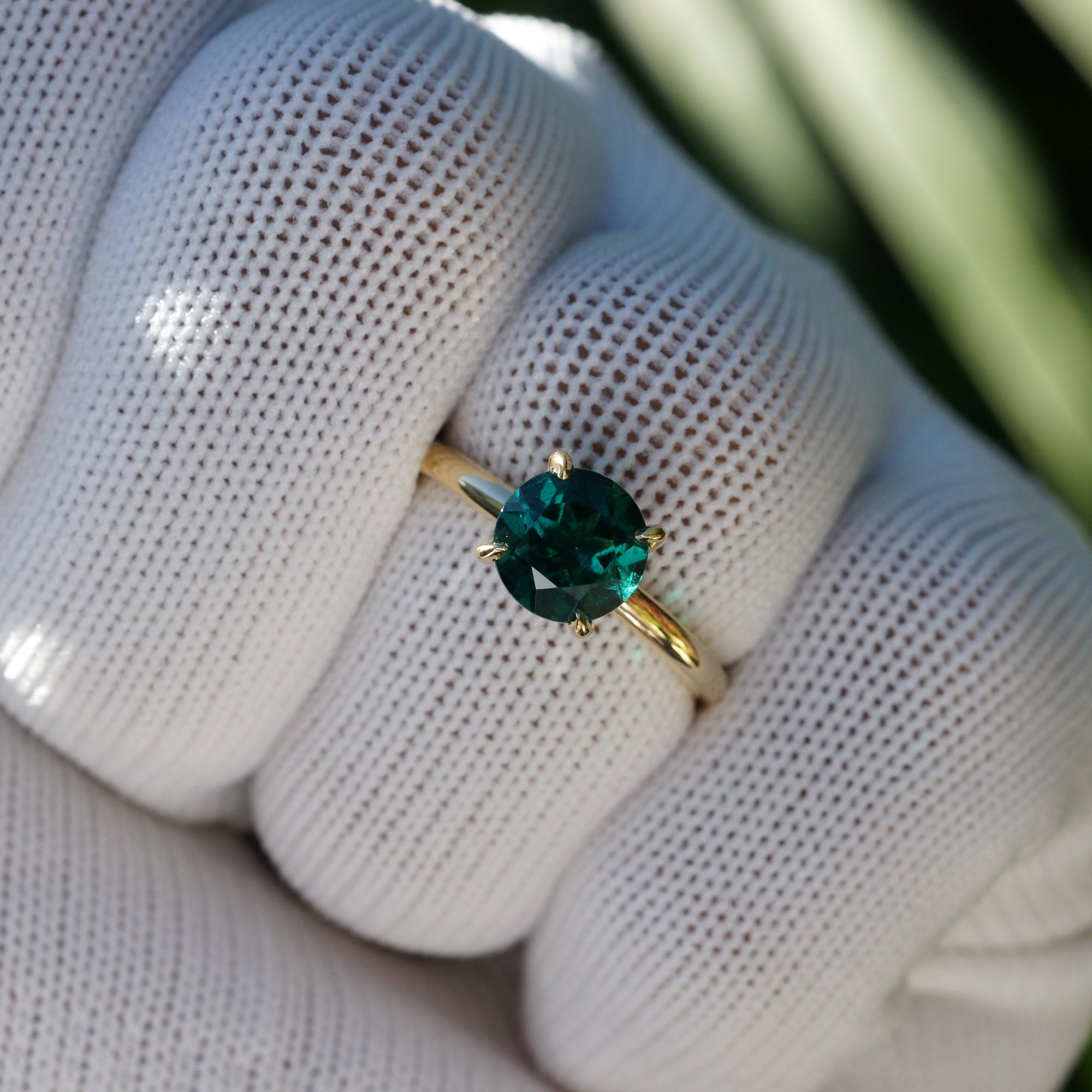 Round cut emerald hidden halo solitaire engagement ring yellow gold the Lucy