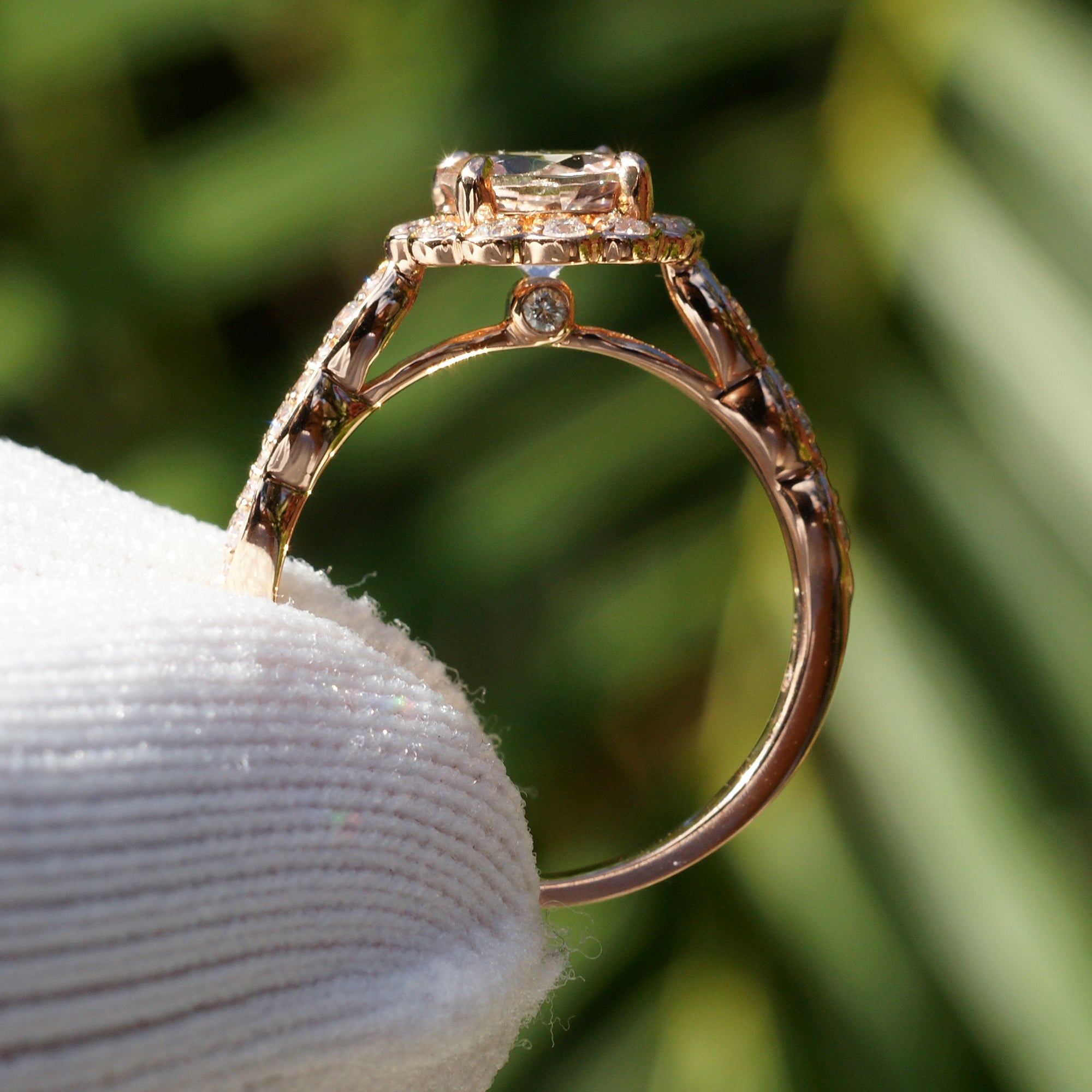Round morganite ring with diamond halo on a scallop vintage setting rose gold