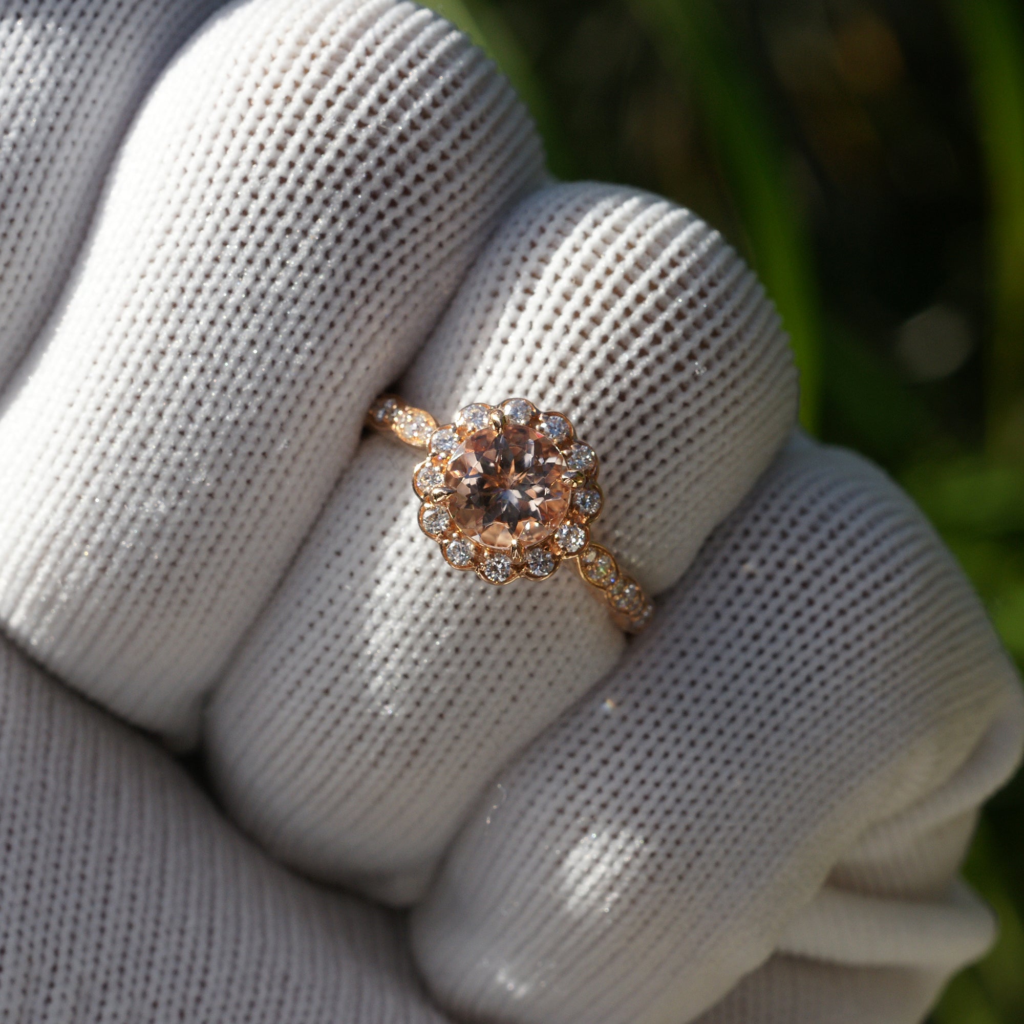 Round morganite ring with diamond halo on a scallop vintage setting rose gold