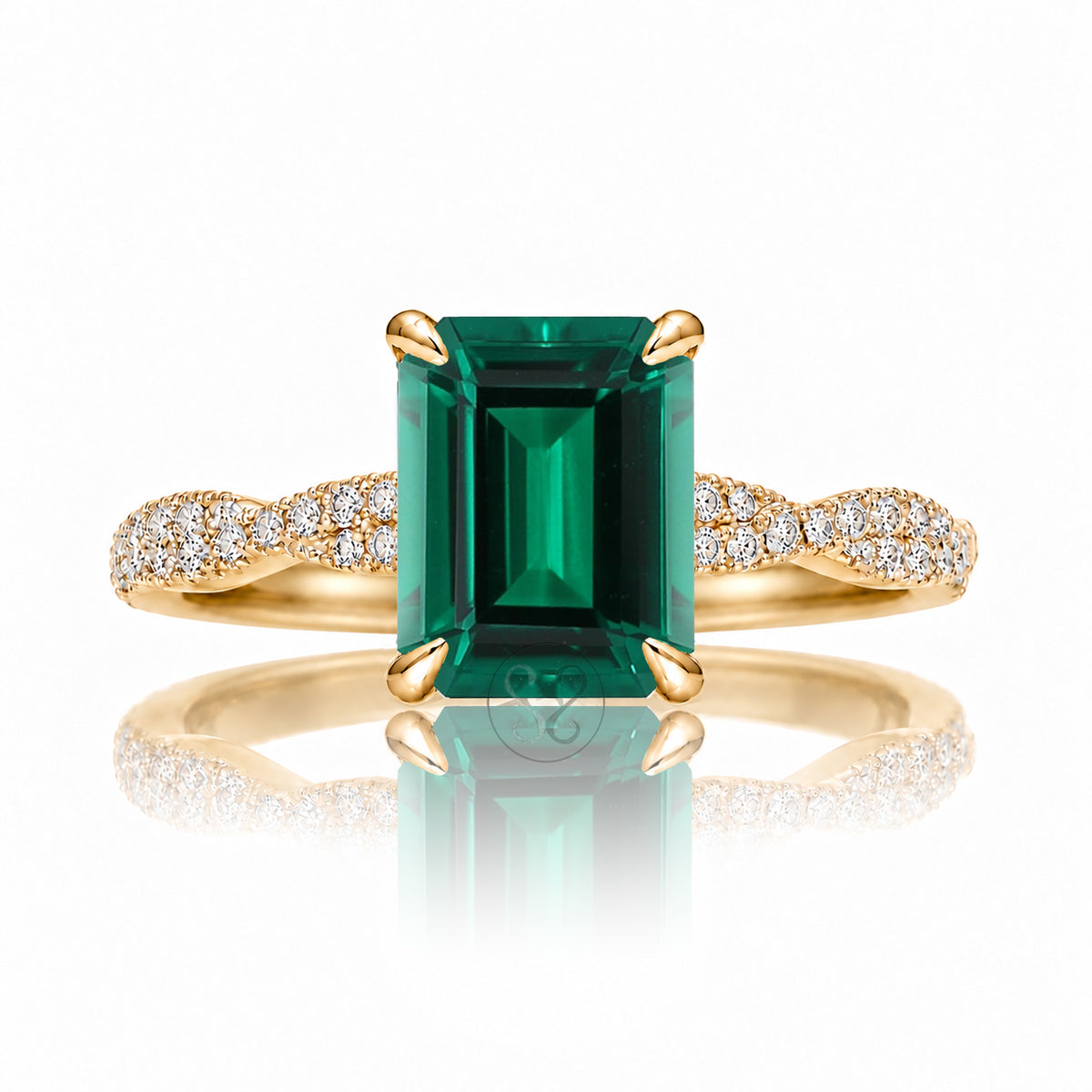 The Seraphina Step Cut Emerald Ring