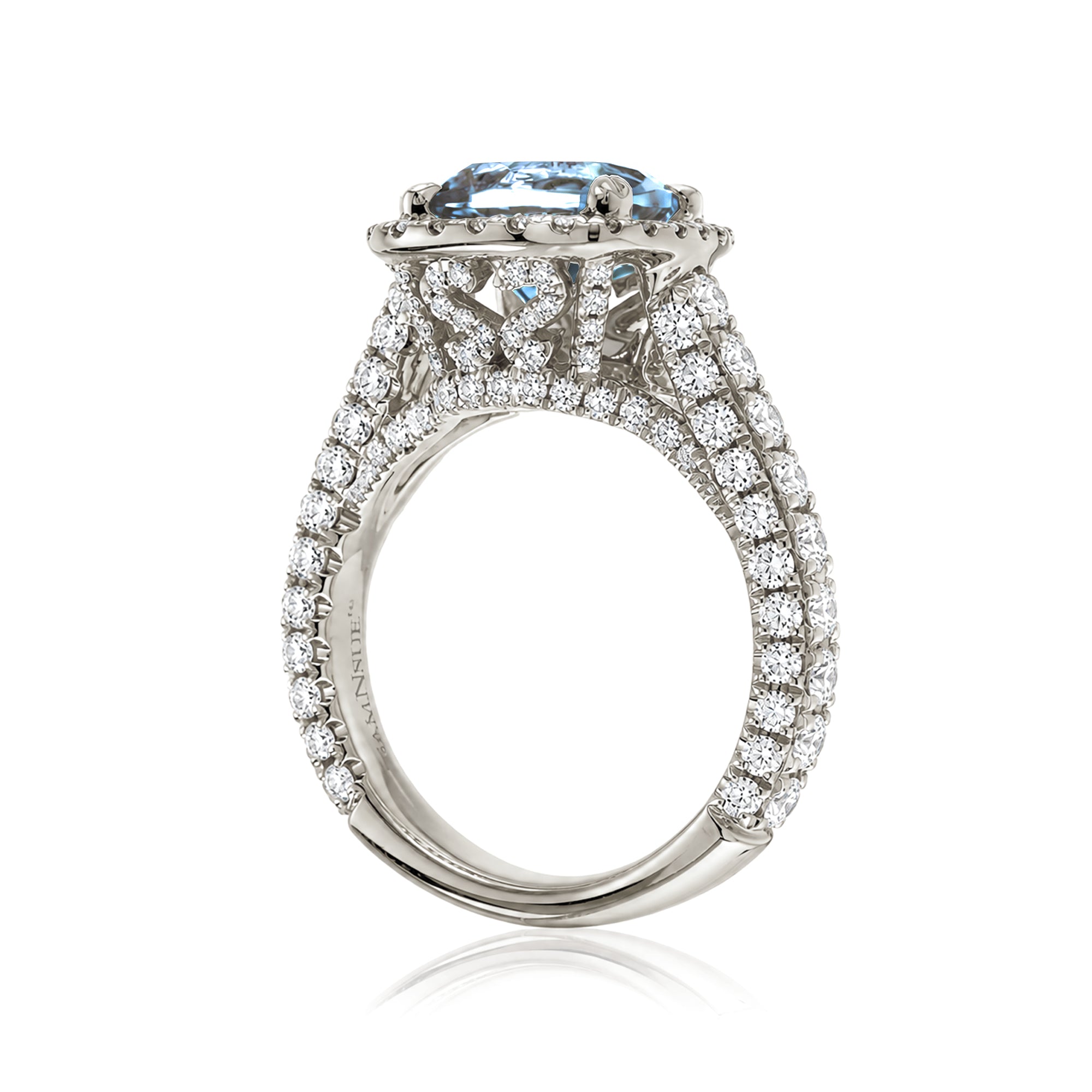 Cushion-cut aquamarine engagement ring in white gold with diamond halo and pavé diamond shoulders The Tamara
