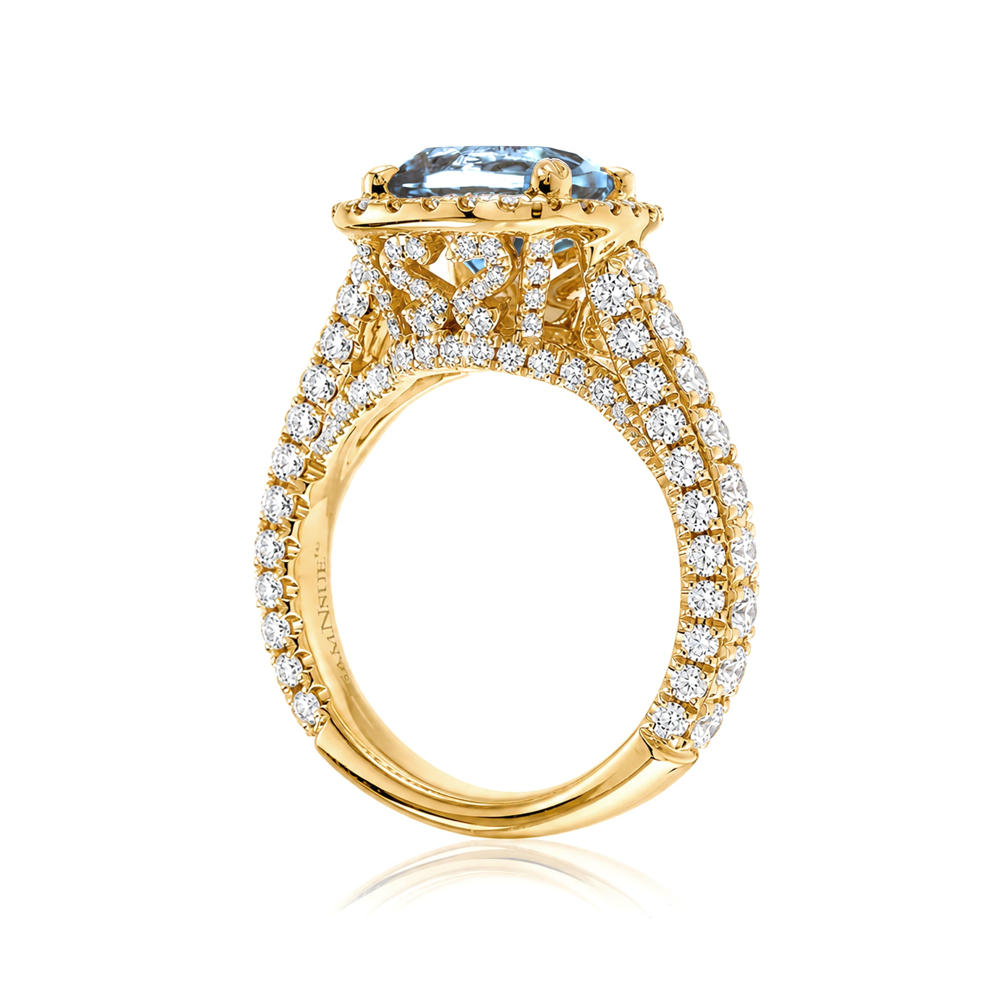 Cushion-cut aquamarine engagement ring in yellow gold with diamond halo and pavé diamond shoulders The Tamara