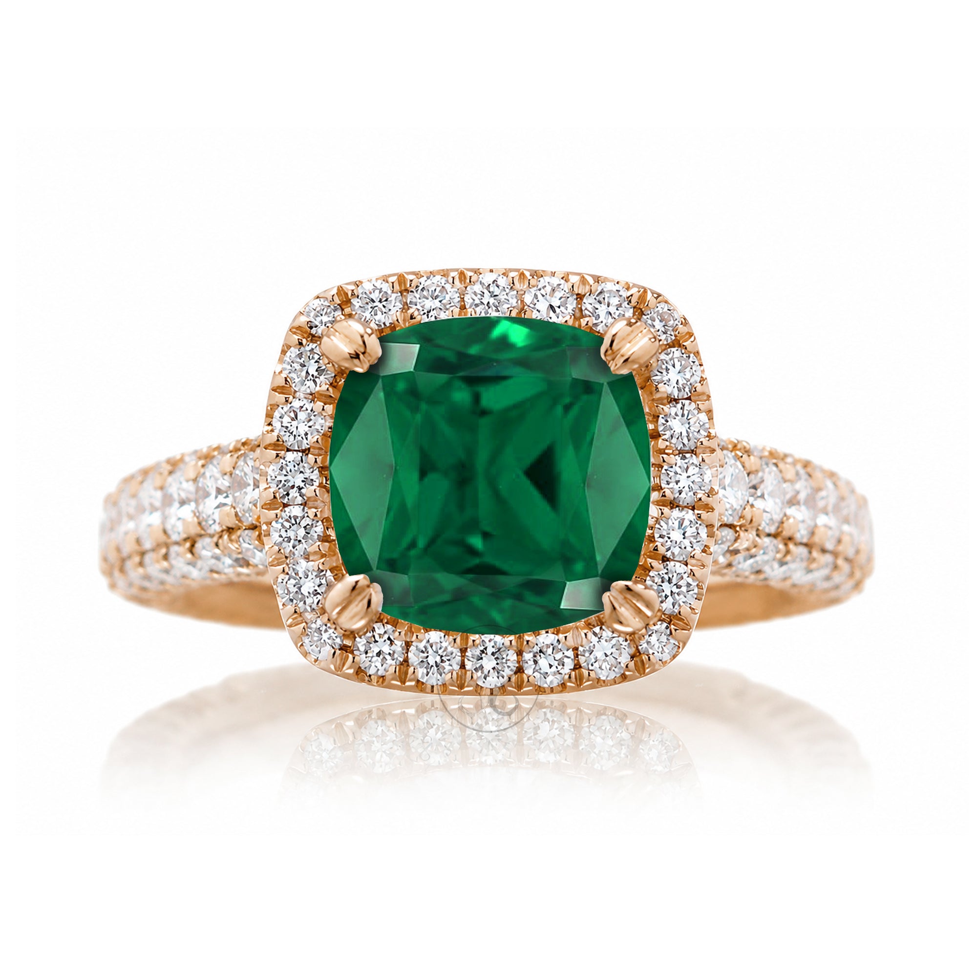 Cushion-cut emerald engagement ring in rose gold with diamond halo and pavé diamond shoulders The Tamara