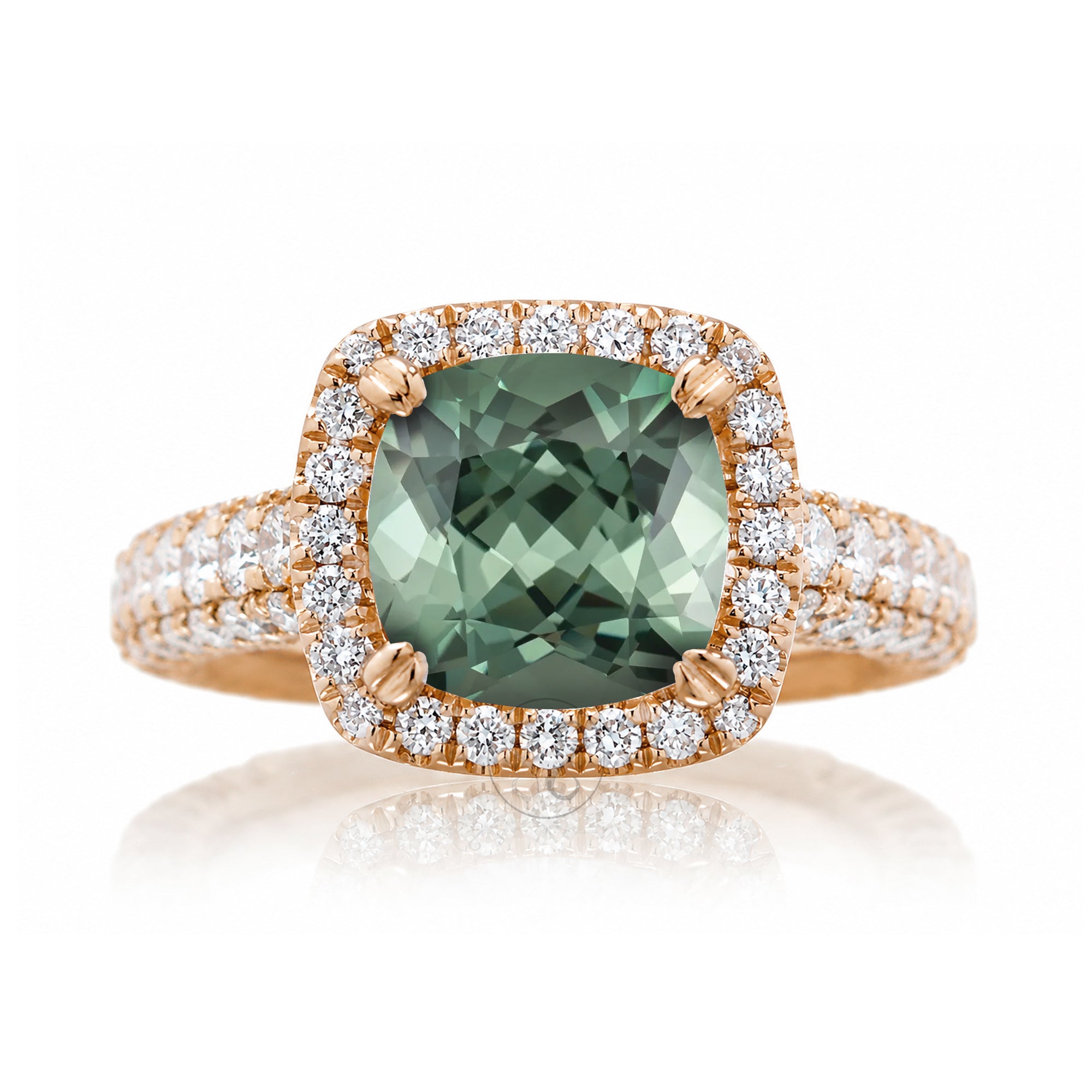 Cushion-cut green sapphire engagement ring in rose gold with diamond halo and pavé diamond shoulders