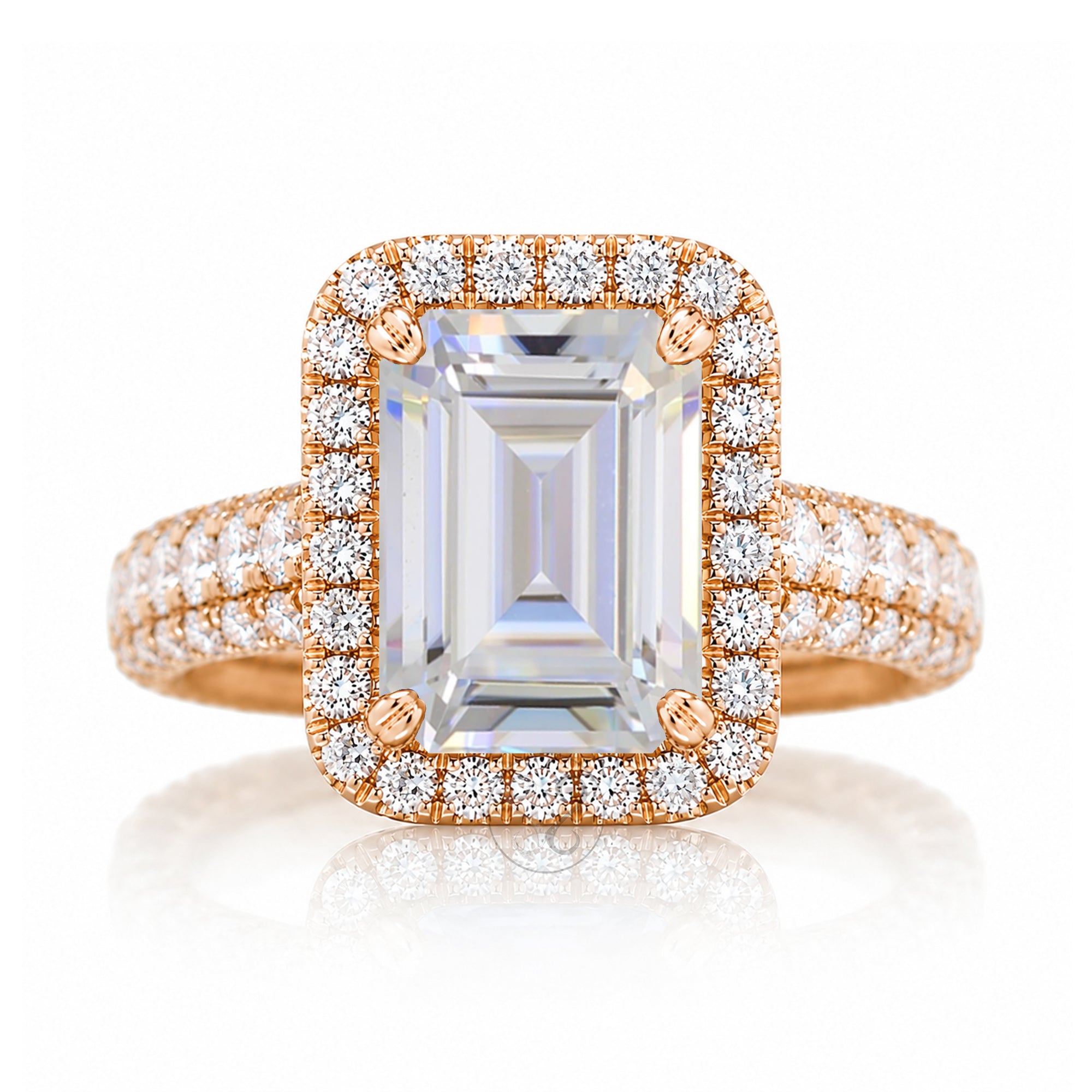 Moissanite emerald cut diamond halo and large three dimensional wide band in rose gold