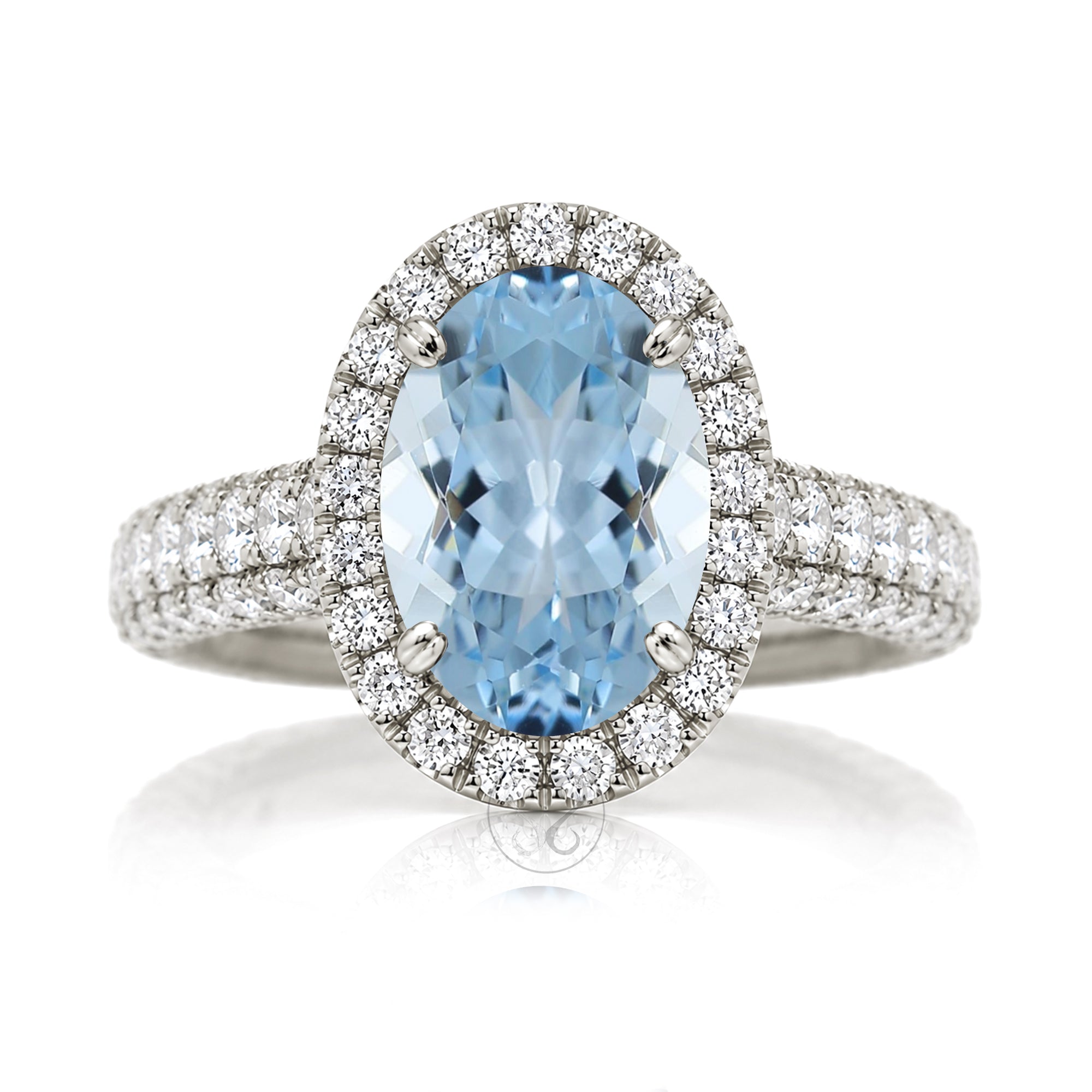 Oval-cut aquamarine engagement ring in white  gold with diamond halo and pavé diamond shoulders The Tamara