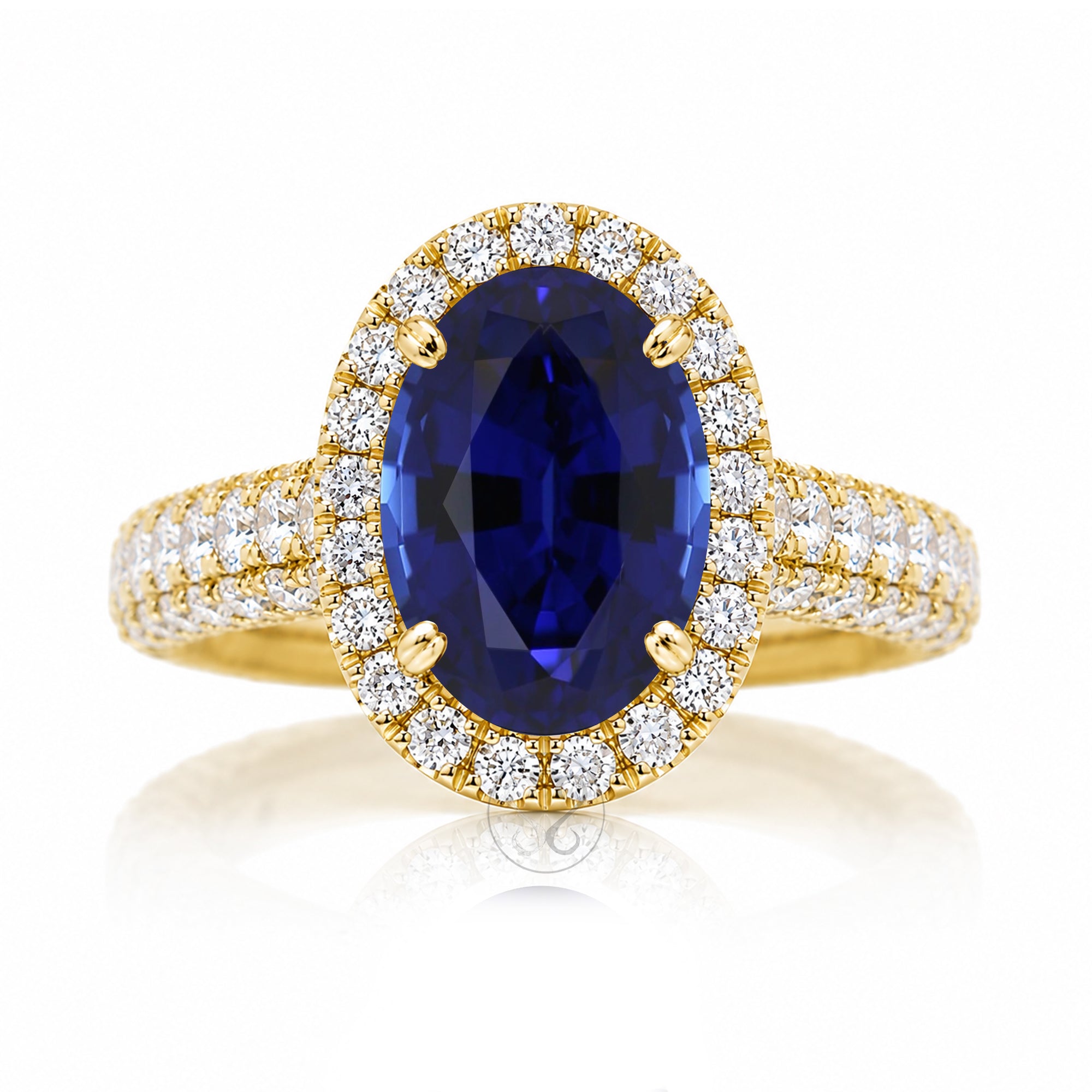 Oval blue sapphire diamond halo with three dimensional dome band in yellow gold