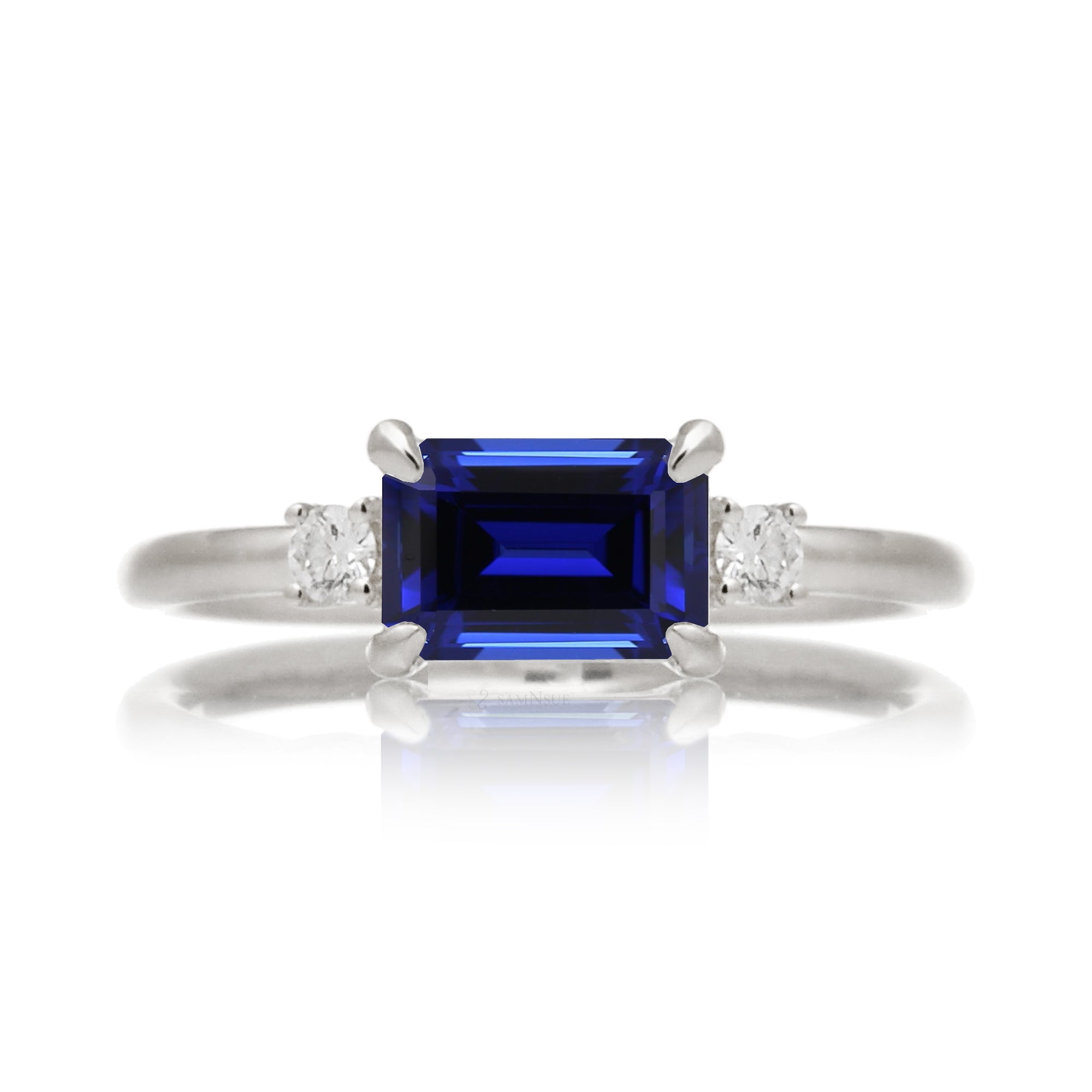 Blue sapphire emerald cut three stone ring the Lena white gold