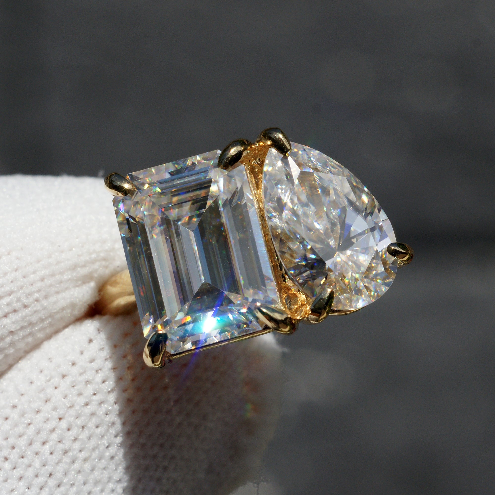 Toi et moi emerald cut and pear cut moissanite ring yellow gold 7ct