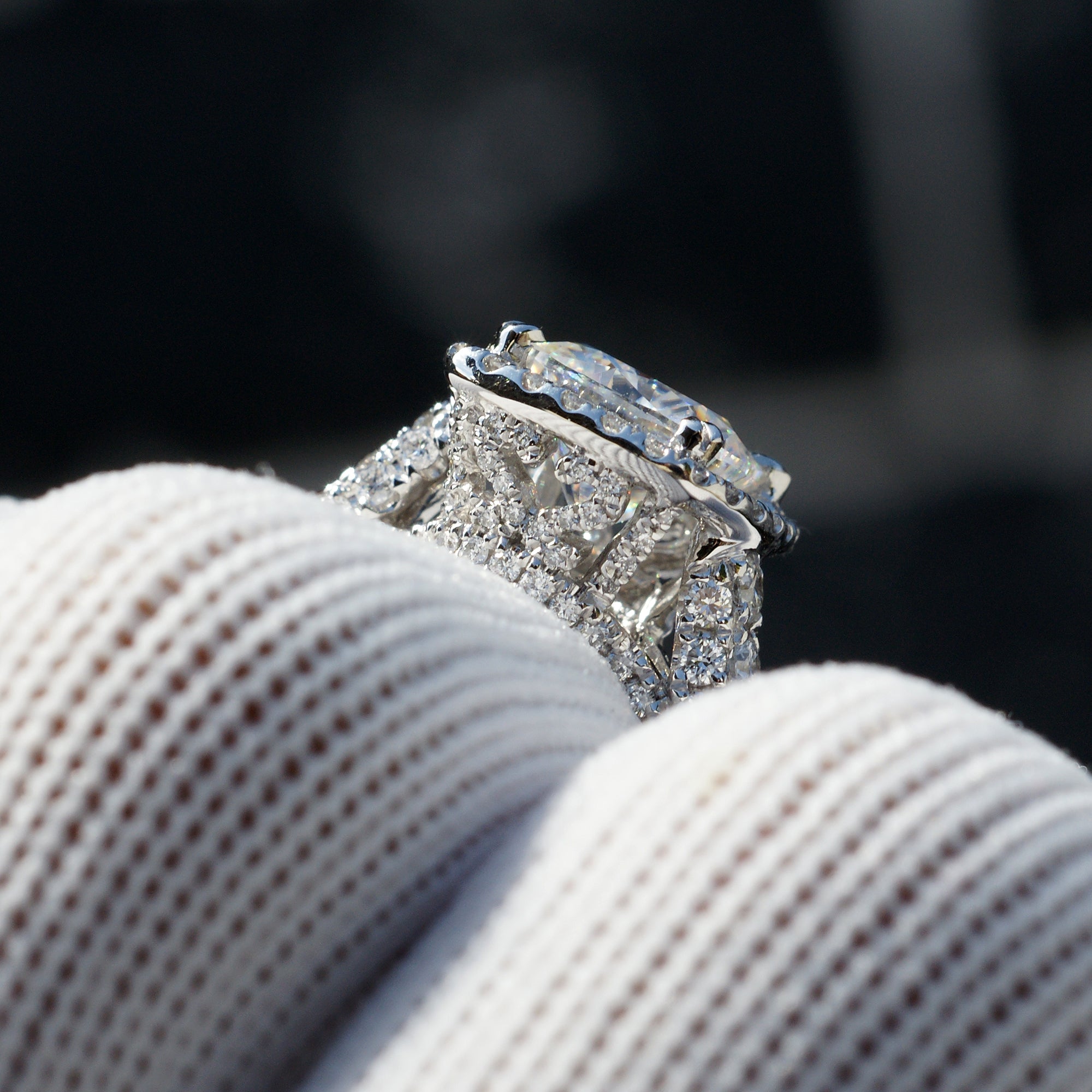 Cushion cut moissanite and diamond halo total drenched engagement ring in white gold