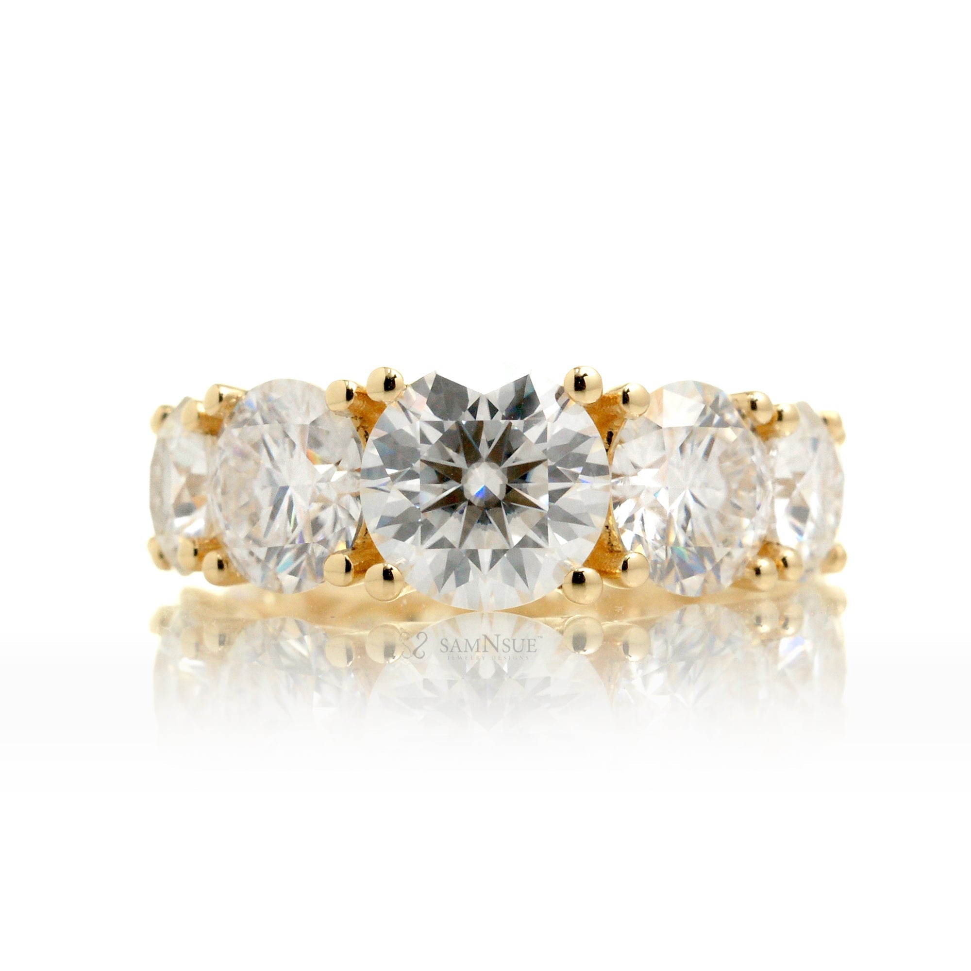 Graduated round moissanite eternity wedding anniversary band yellow gold