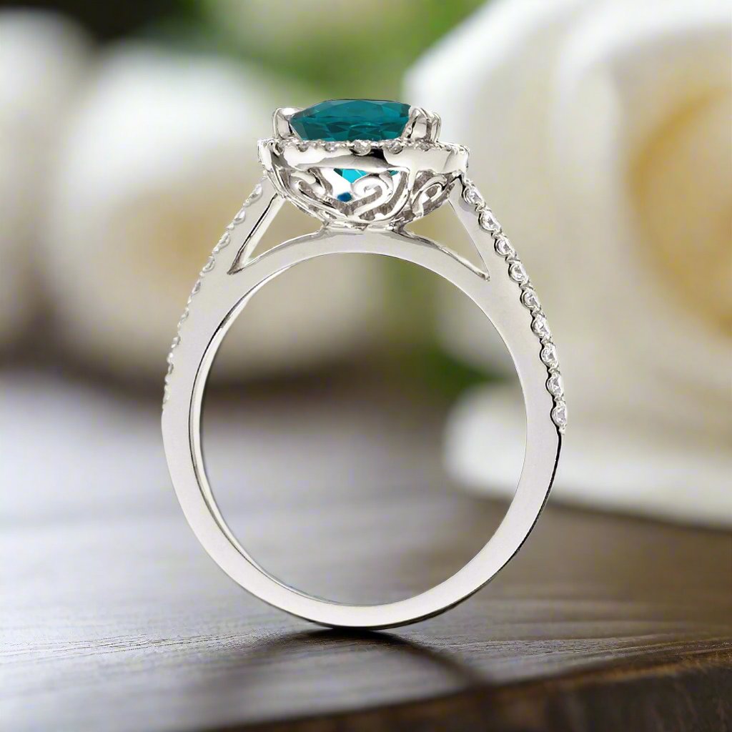 London blue topaz pear shape diamond halo engagement ring