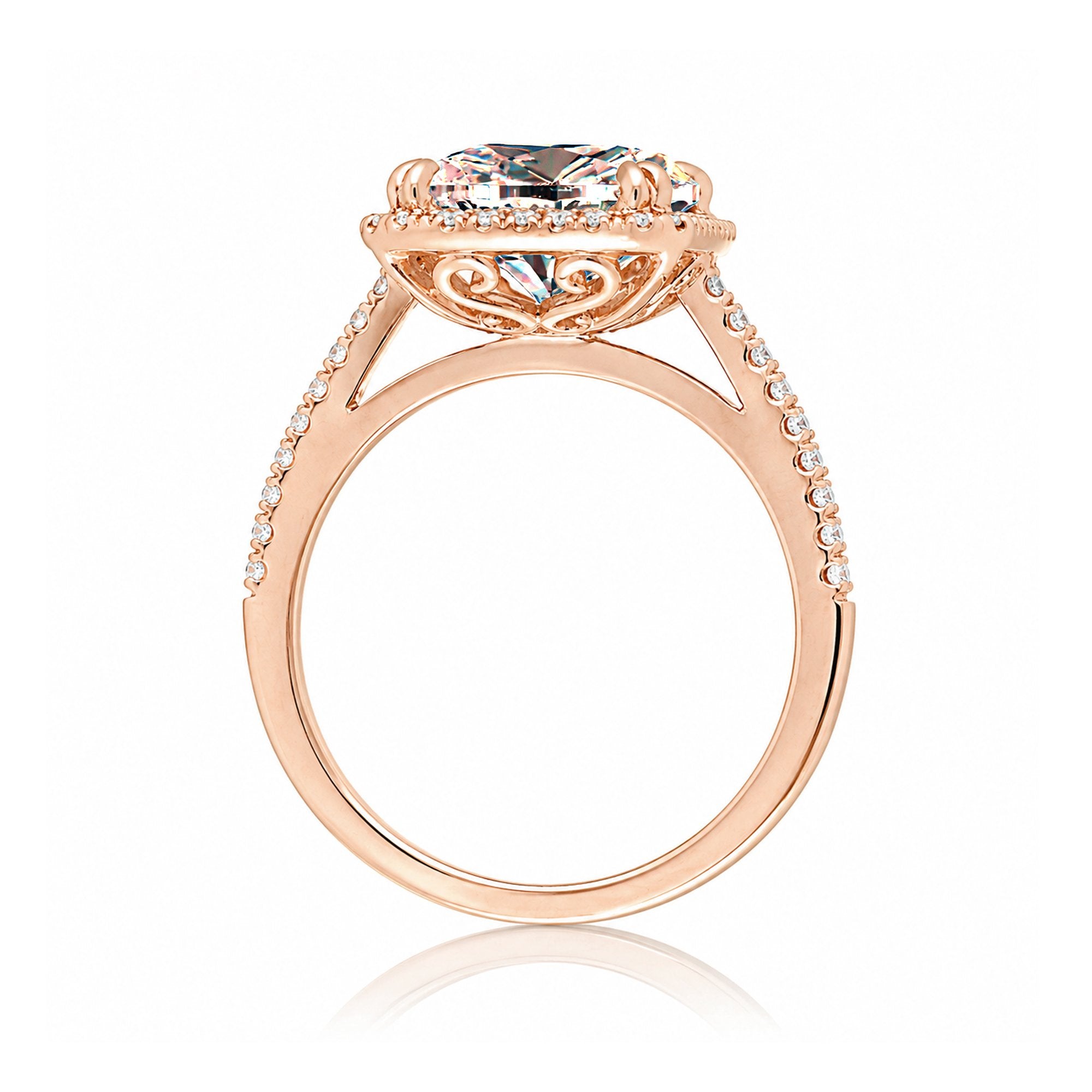 Cushion cut morganite ring with a diamond halo in rose gold