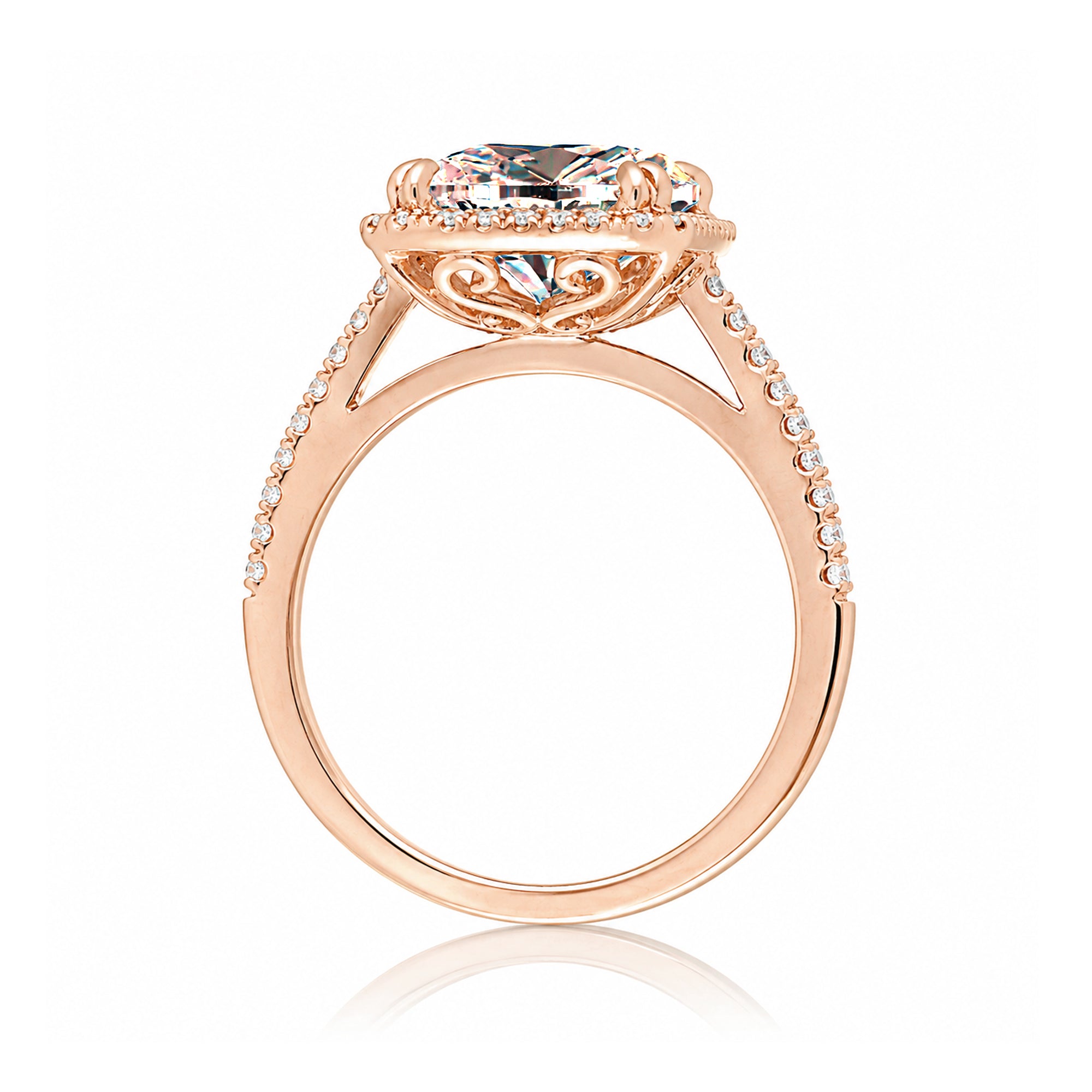Emerald cut morganite ring with diamond halo in rose gold