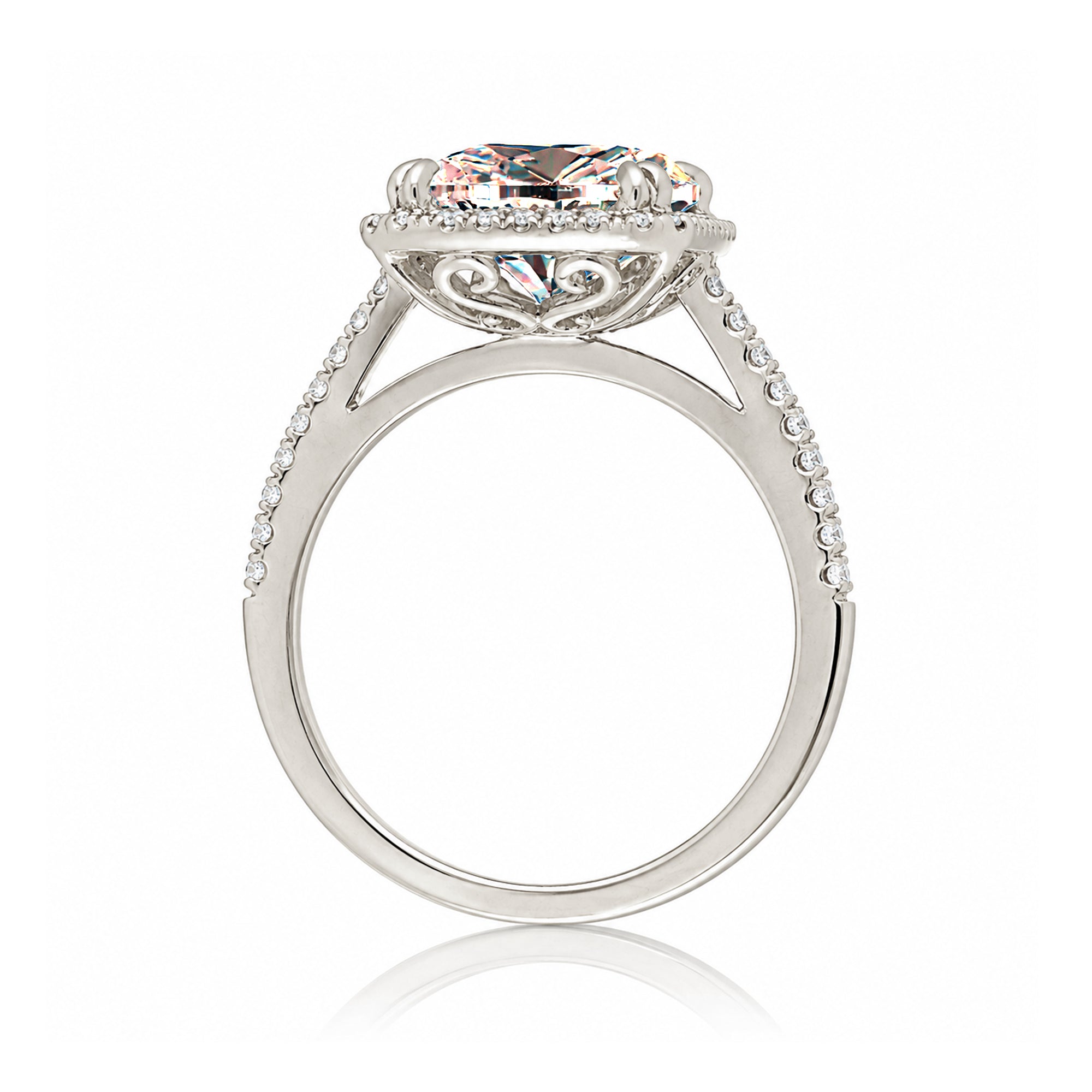 Emerald cut morganite ring with diamond halo in white gold