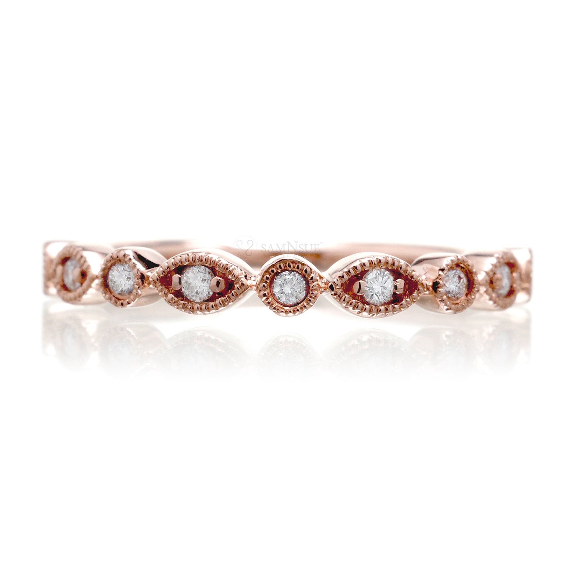 Stackable diamond wedding band with alternating shapes