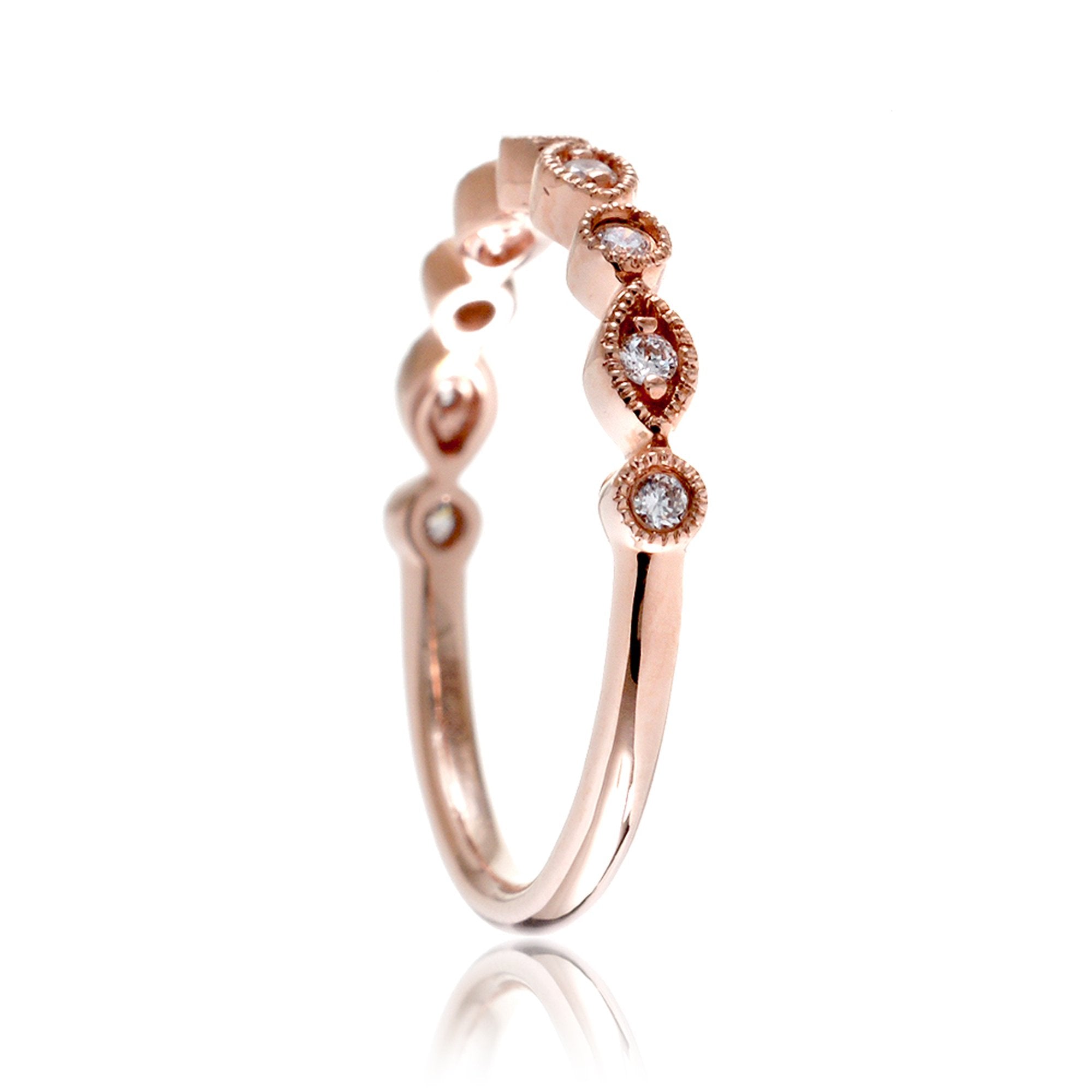 Stackable diamond wedding band with alternating shapes