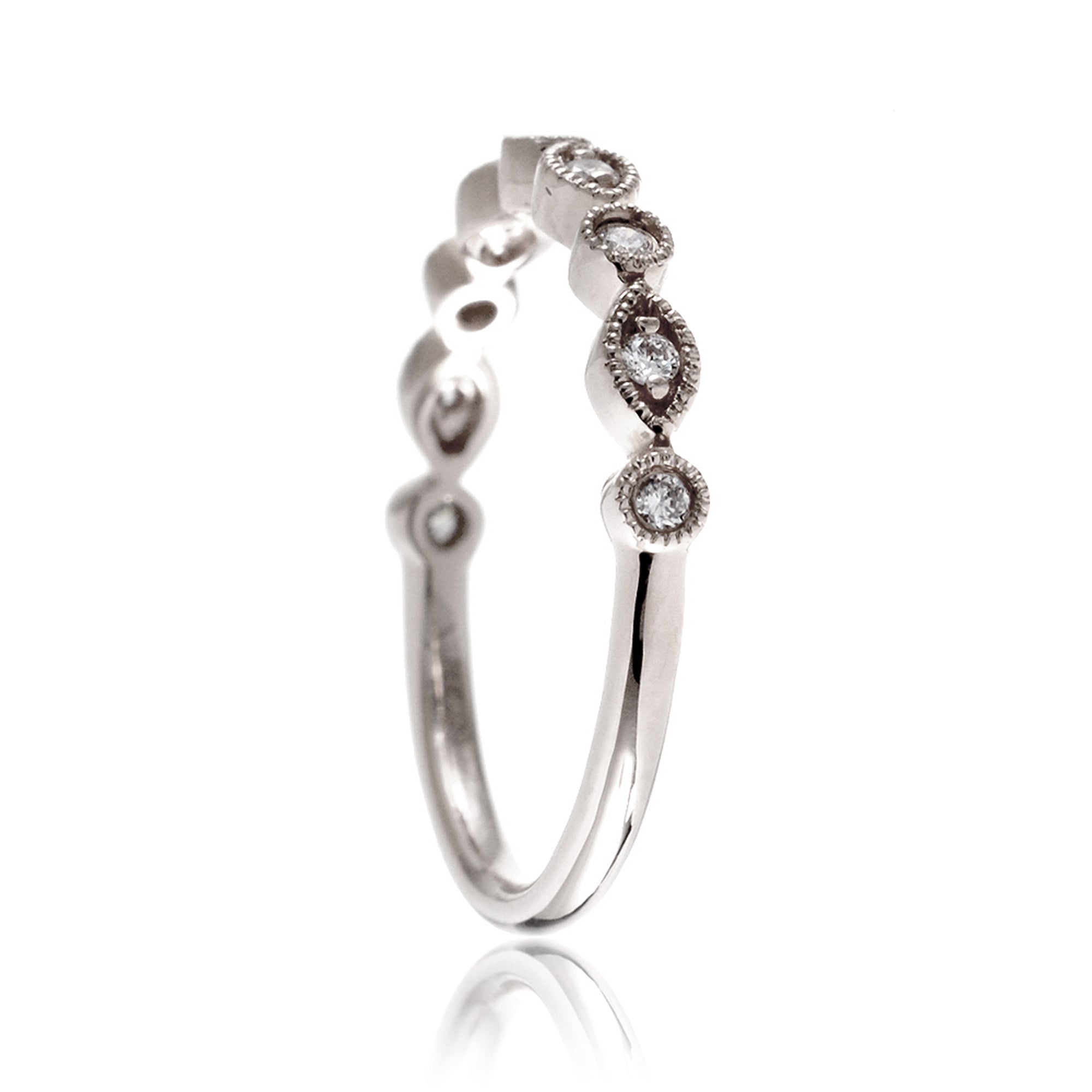 Vintage style diamond ring with milgrain detailing in white gold