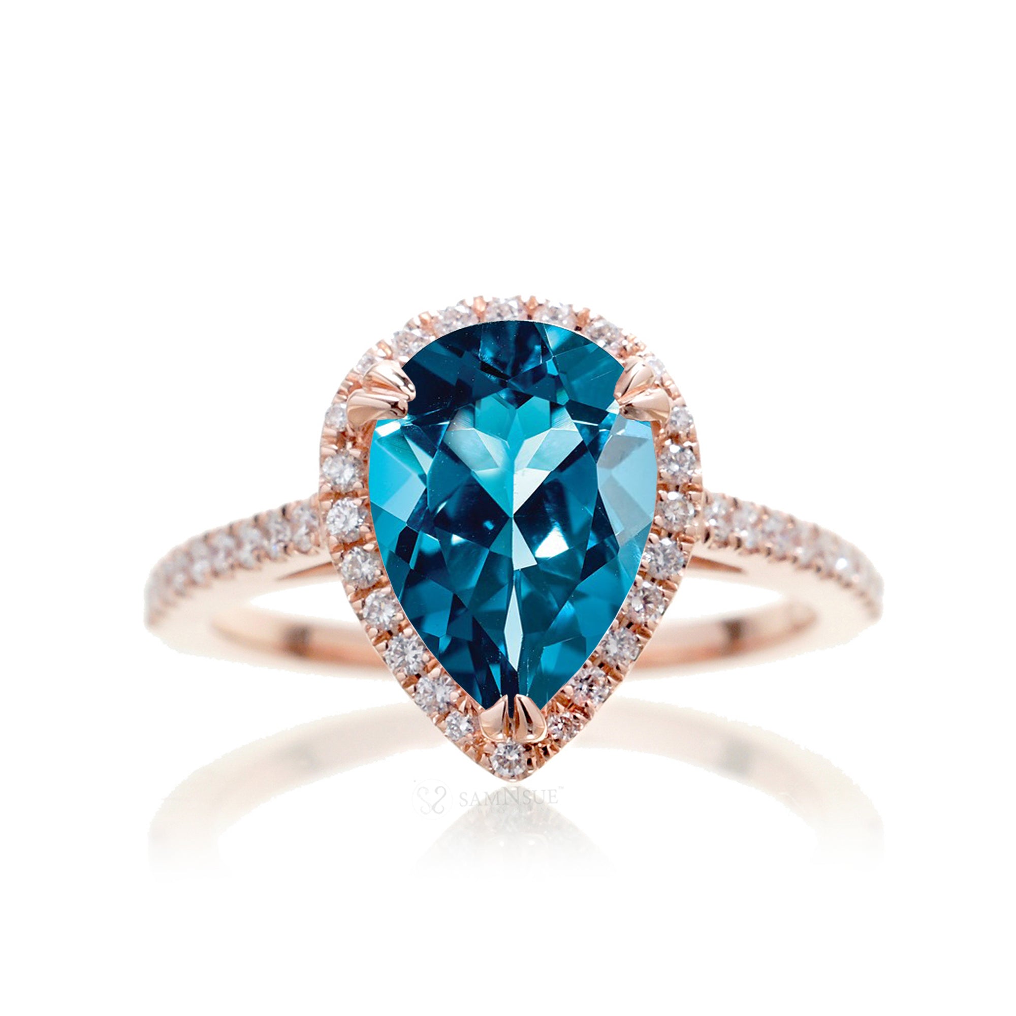 London blue topaz pear shape diamond halo engagement ring