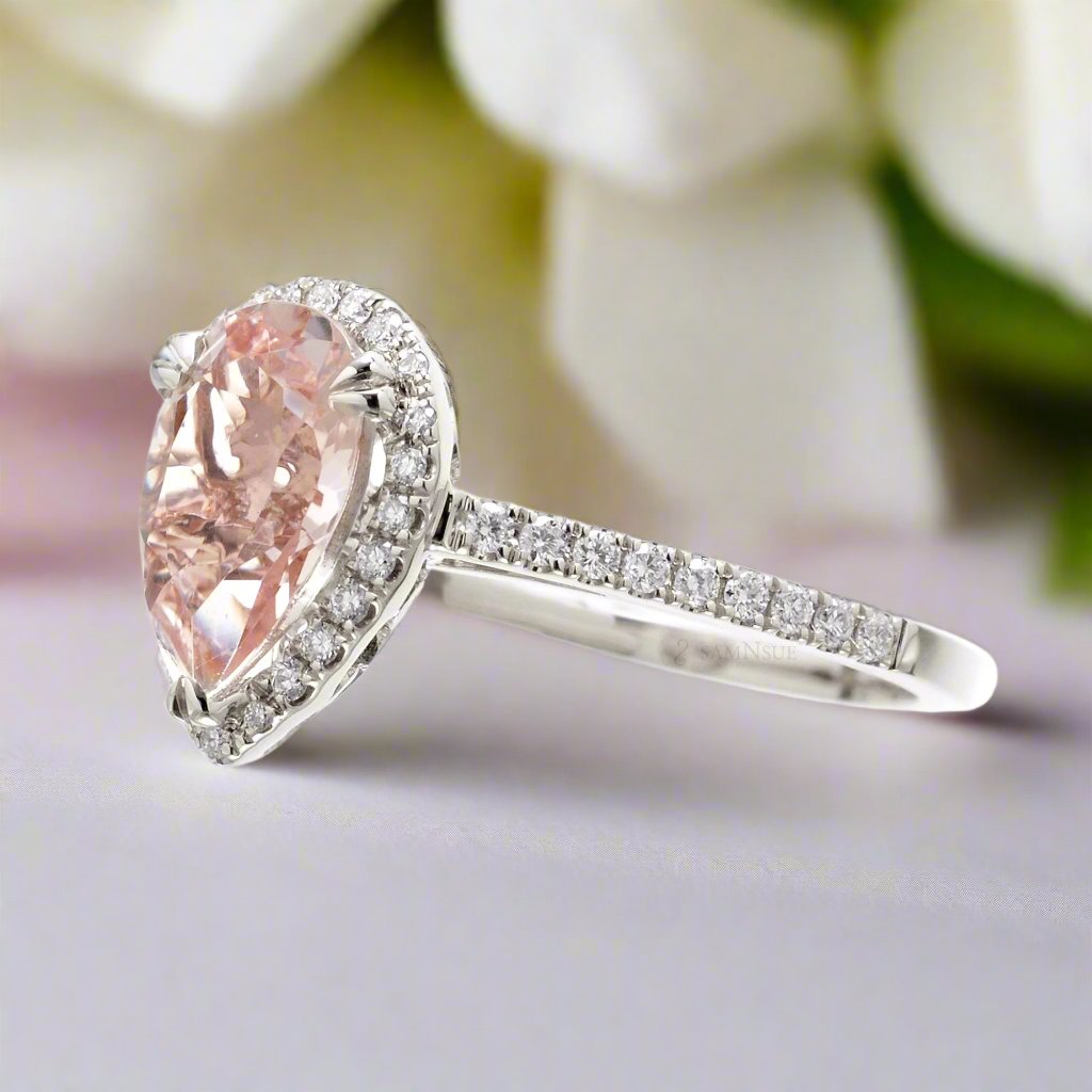 Pear Morganite Engagement Ring With A Diamond Halo Cathedral Setting