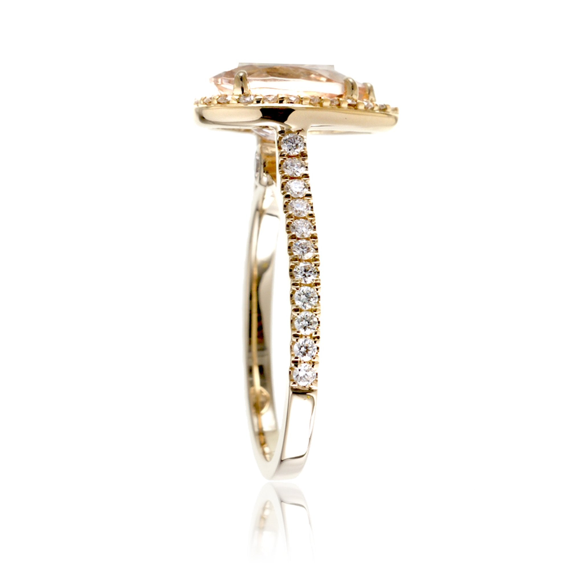 Pear cut morganite ring with diamond halo and band in the Sunset yellow gold