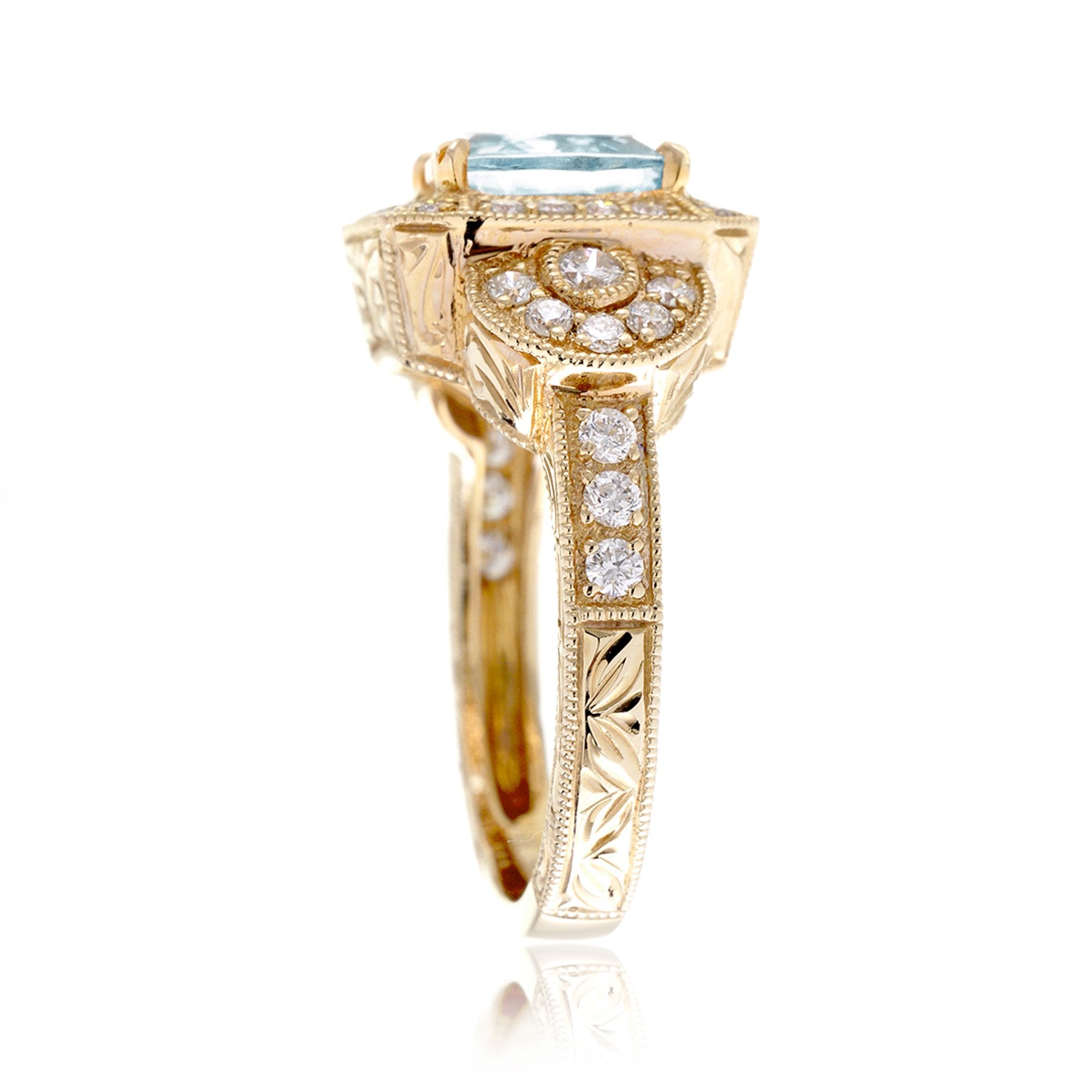 Cushion cut aquamarine vintage antique style three stone diamond halo ring yellow gold