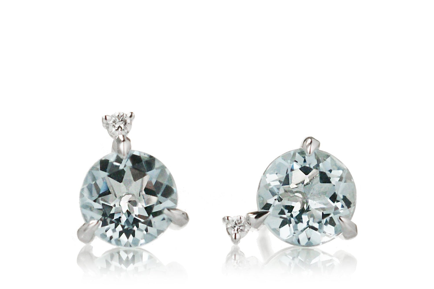 Round aquamarine stud earrings with diamond accent