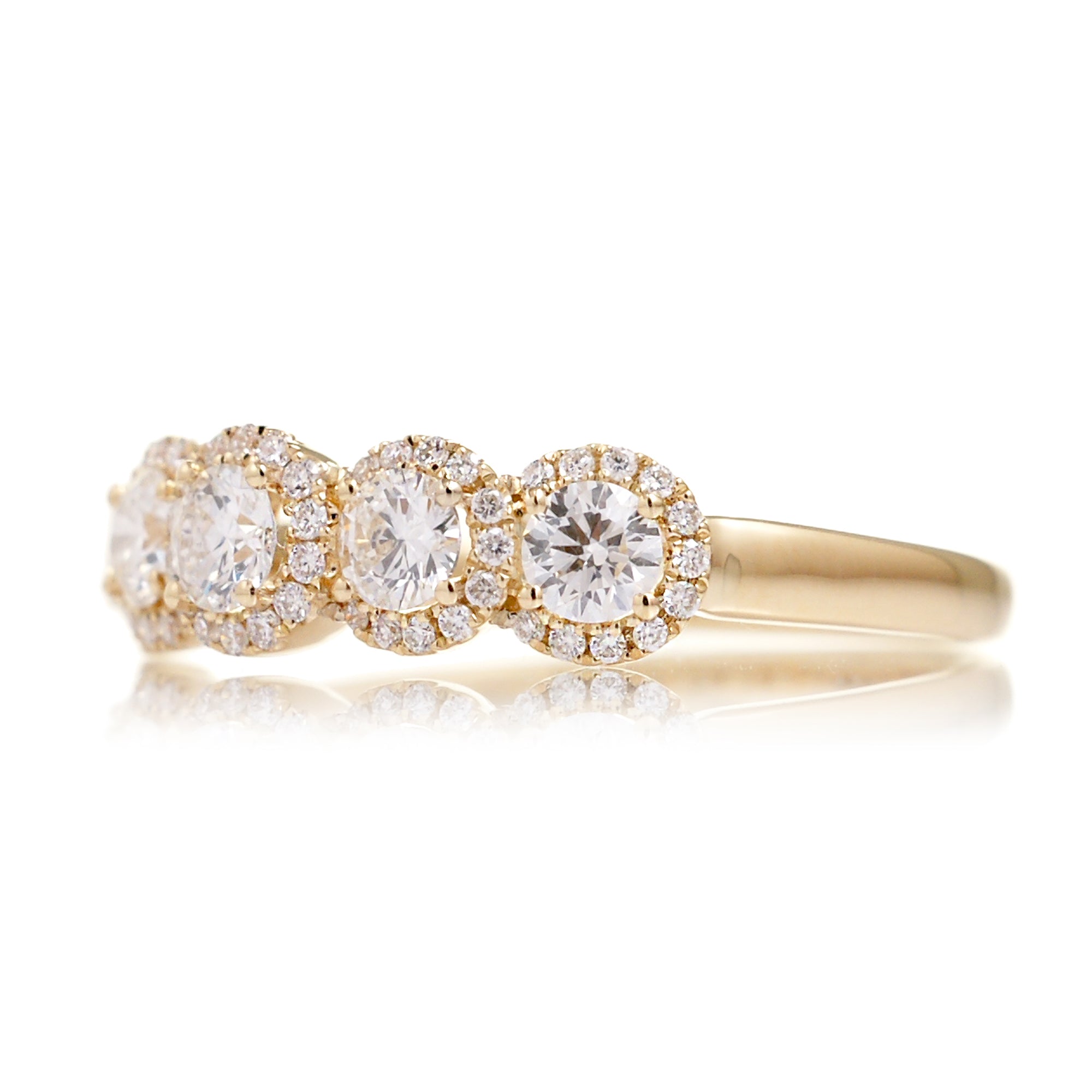 Five round diamond halo wedding anniversary band in yellow gold