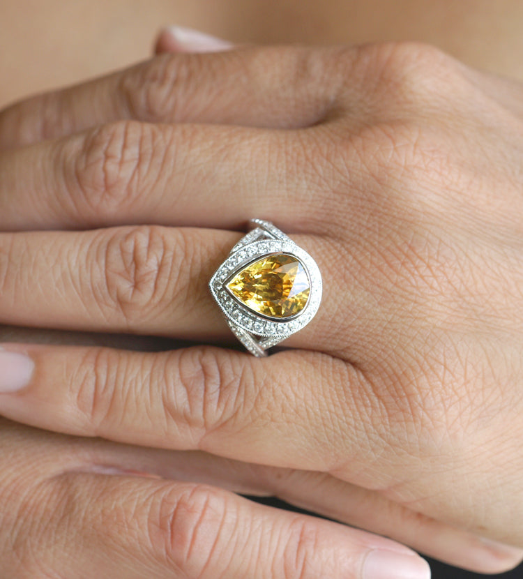 Luxurious Halo Radiant Cut Yellow Sapphire Engagement Ring from Black  Diamonds New York
