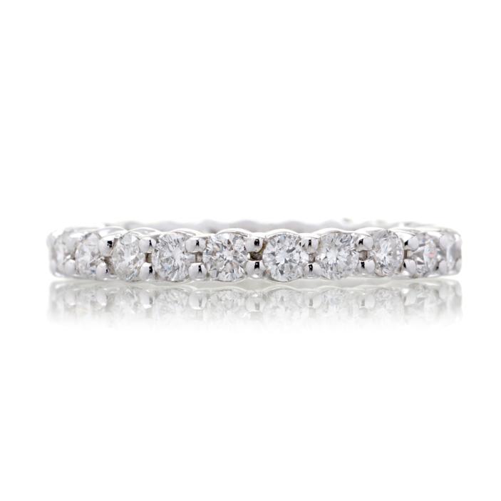Eternity diamond band with double shared prongs in white gold