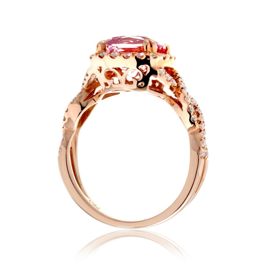 Cushion lab-grown pink sapphire with natural diamond halo and twist shank rose gold ring