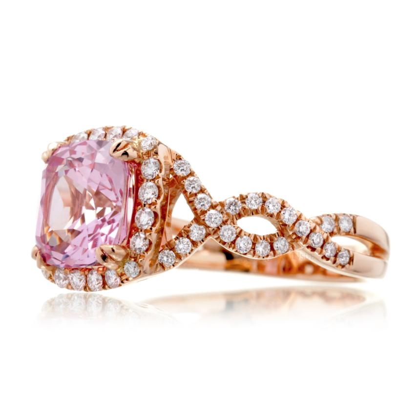 Cushion lab-grown pink sapphire with natural diamond halo and twist shank rose gold ring