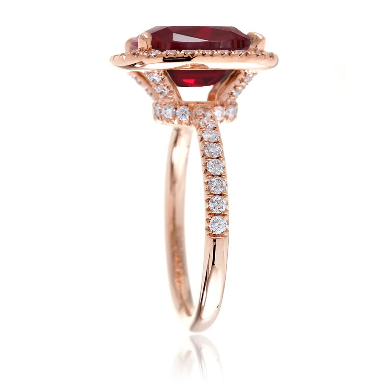 Oval cut ruby and diamond engagement ring the Drenched rose gold profile view