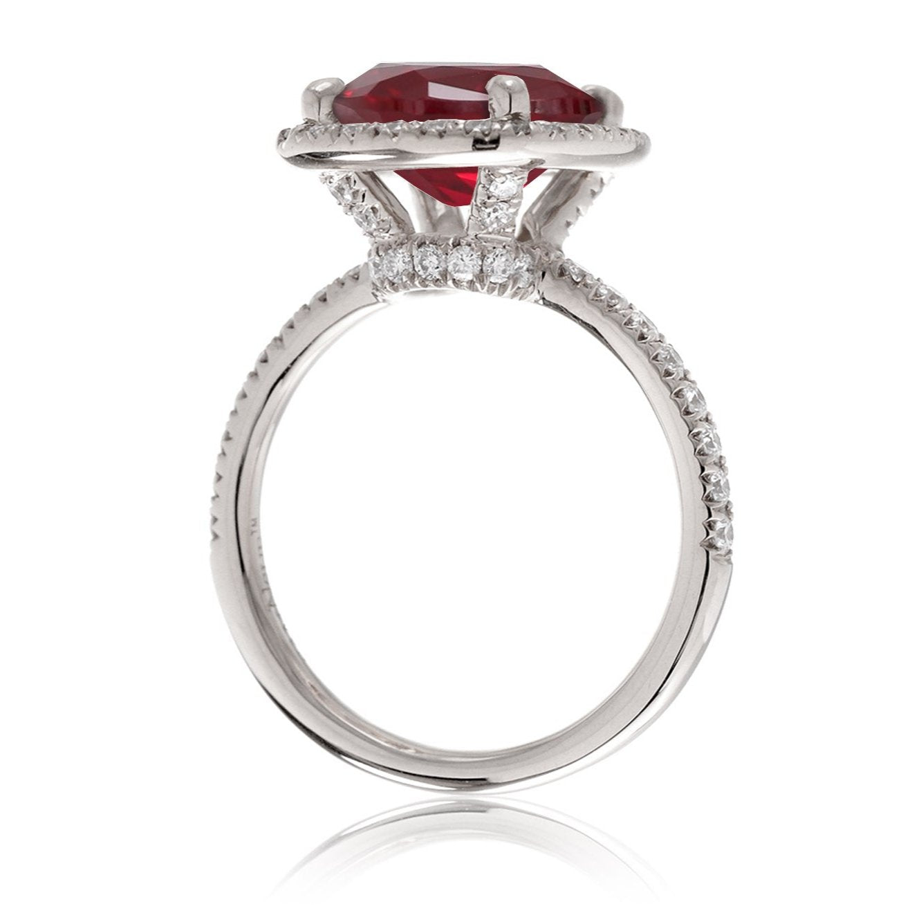 Oval cut ruby and diamond engagement ring the Drenched white gold side view