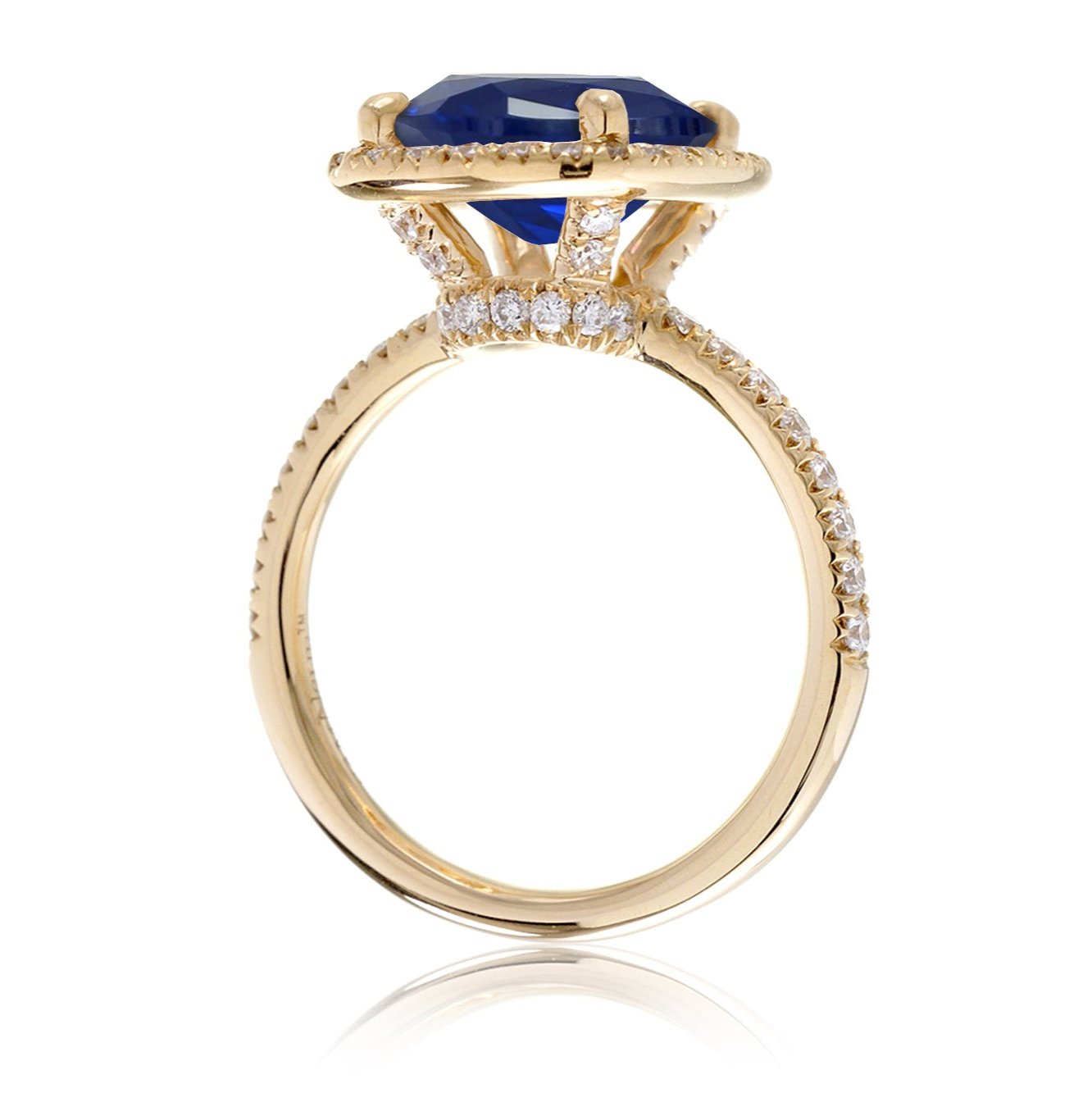 Emerald cut blue sapphire engagement ring diamond halo the Drenched yellow gold