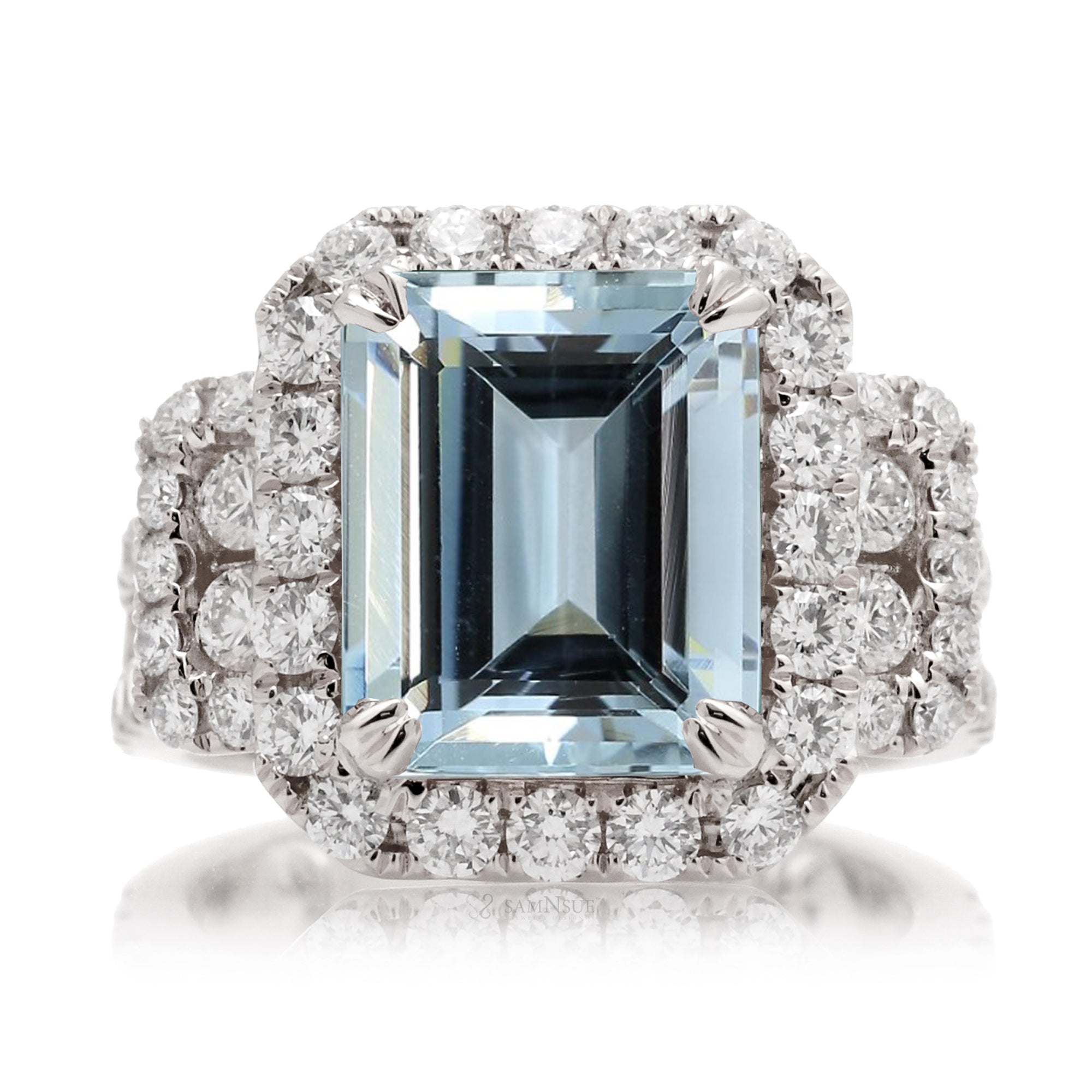 Emerald cut aquamarine with diamond halo and three stone bold wide setting engagement anniversary ring in white gold